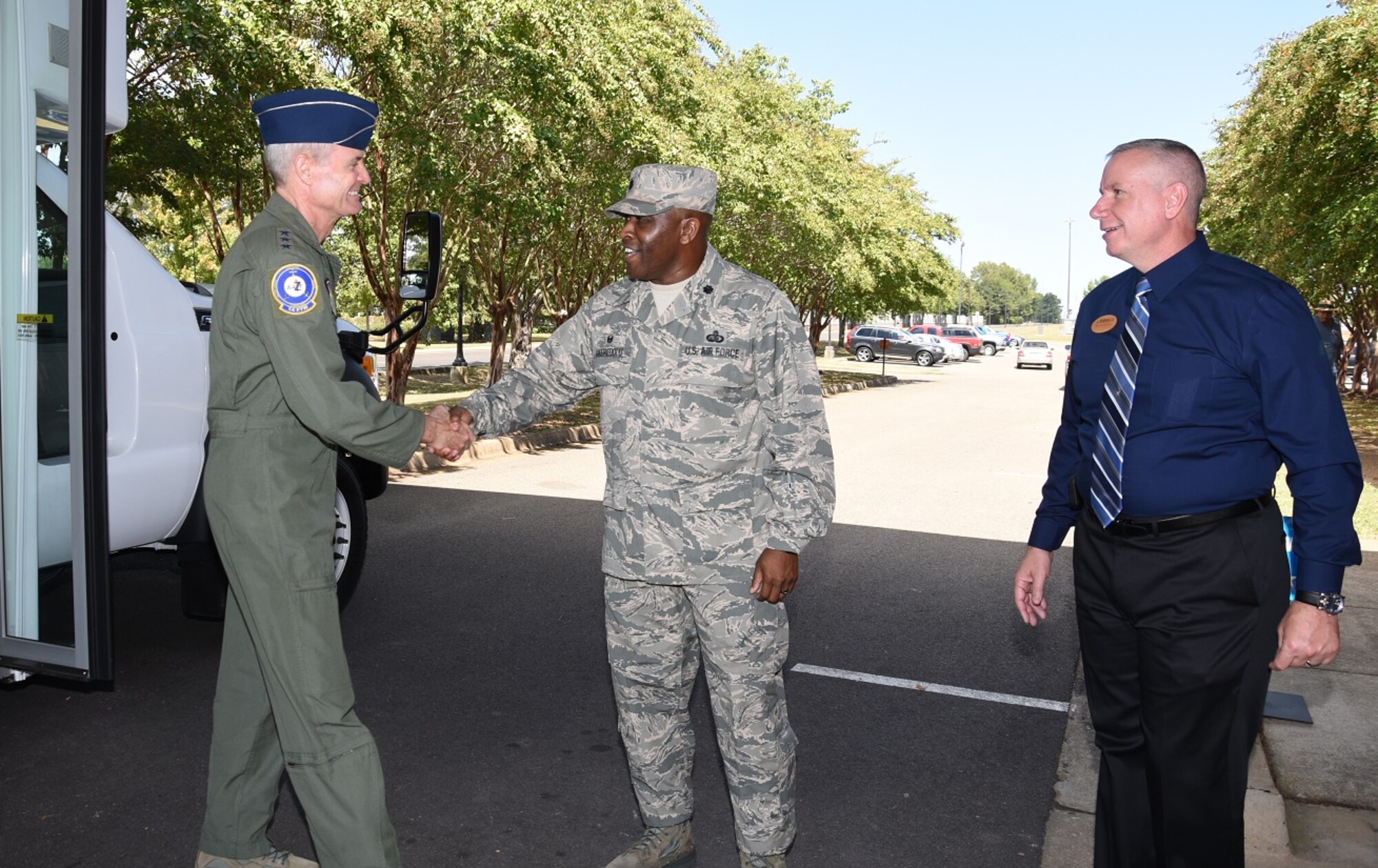 Lt. Gen. Darryl Roberson, Commander Air Education and Training Command, is greeted by Lt. Col. Daniel Akeredolu, 14th Force Support Squadron Commander, and other 14th FSS leaders Sept. 12, 2016 at Columbus Air Force Base, Mississippi. Roberson, his wife Cheryl, and Chief Master Sgt. David Staton, AETC Command Chief, were able to dine in the recently renovated Columbus Club during their visit. (U.S. Air Force photo/Elizabeth Owens)