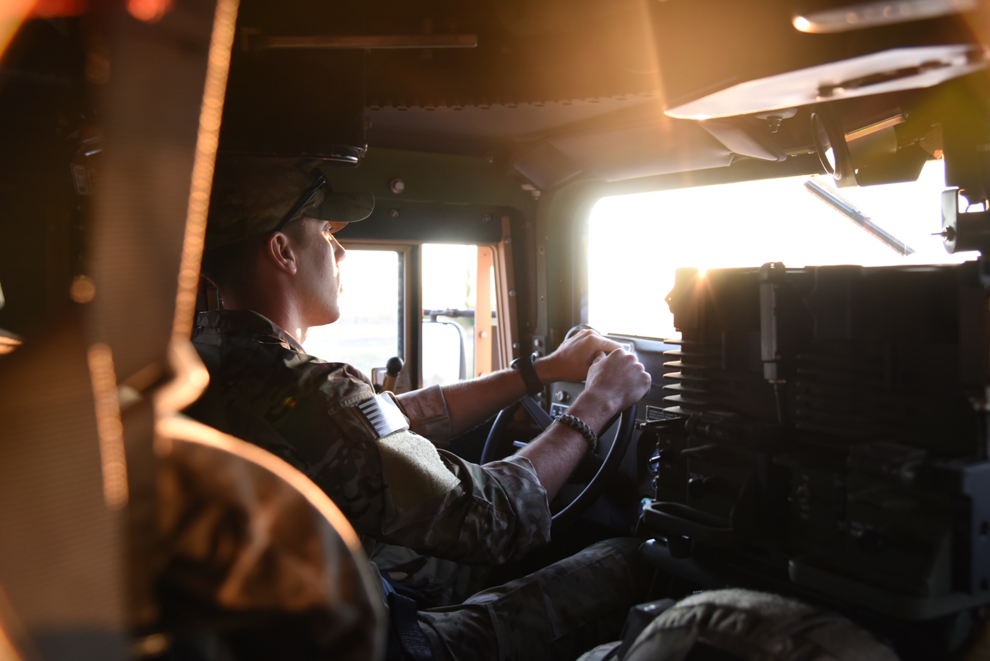 FORT CARSON, Colo. – Senior Airman John Hill, 302nd Civil Engineer Squadron Explosive Ordnance Disposal journeyman, leads a convoy of EOD technicians to the bombing range at Fort Carson, Colo., Aug. 31, 2016. Organized by the 21st CES EOD flight, the team set out to test their skills during a live, mass-demolition training operation. (U.S. Air Force photo by Airman 1st Class Dennis Hoffman)
