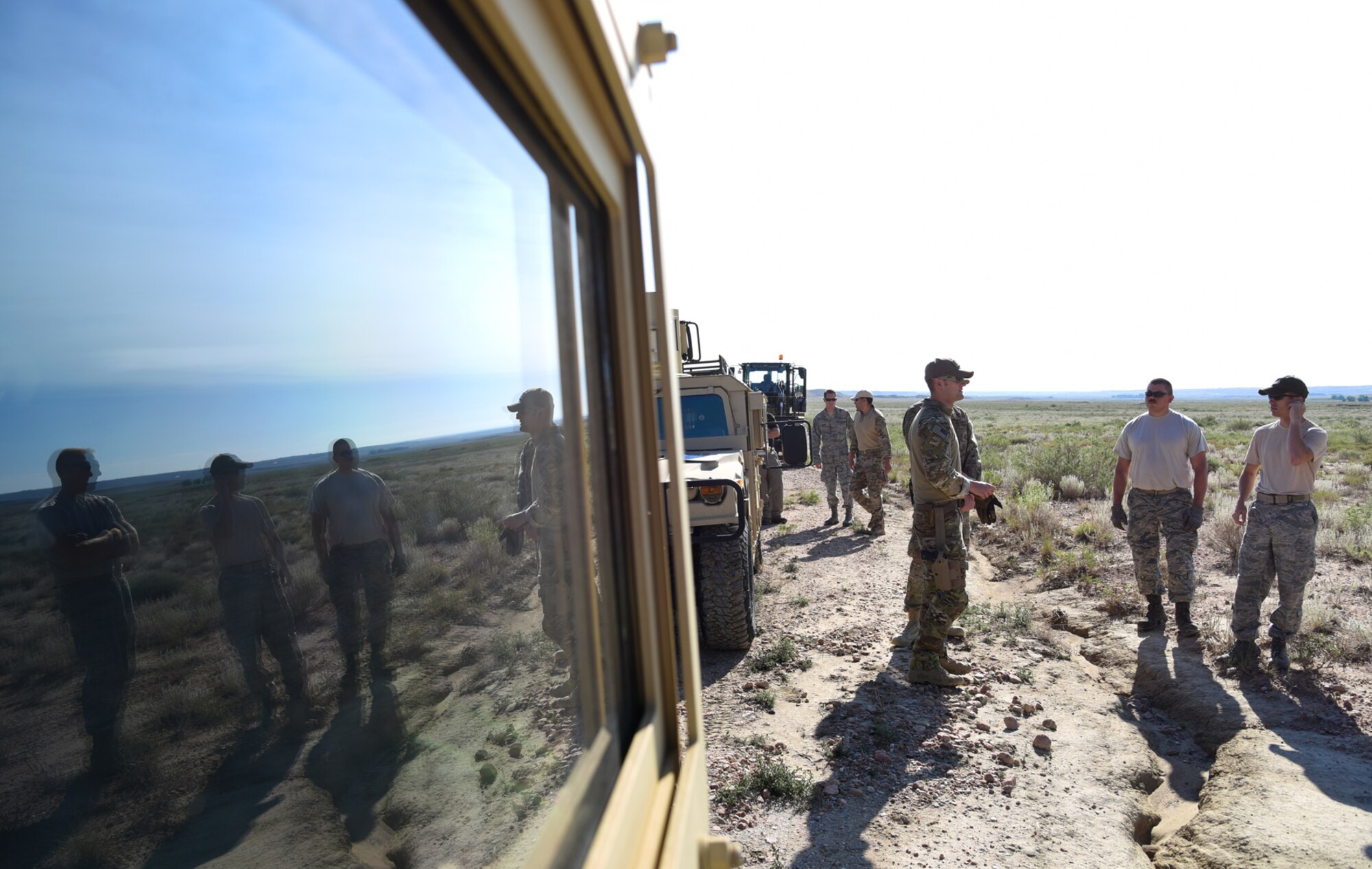 FORT CARSON, Colo. – Explosive Ordnance Disposal technicians from the Colorado Springs military community engage in a safety brief before the day’s training at the bombing range on Fort Carson, Colo., Aug 31, 2016. Airmen from the 302nd Logistics Readiness Squadron, 302nd Civil Engineer Squadron EOD flight, 21st CES EOD flight, 21st Medical Group and the United States Air Force Academy munitions team were all involved in the training. (U.S. Air Force photo by Airman 1st Class Dennis Hoffman)