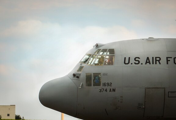 A C-130 Hercules assigned to the 36th Airlift Squadron taxis for takeoff at Yokota Air Base, Japan, Sep. 7, 2016. Yokota’s C-130s support the largest geographic area of any combatant command, which spans approximately 50 percent of the world’s surface. (U.S. Air Force Photo by Airman 1st Class Baker/Released)