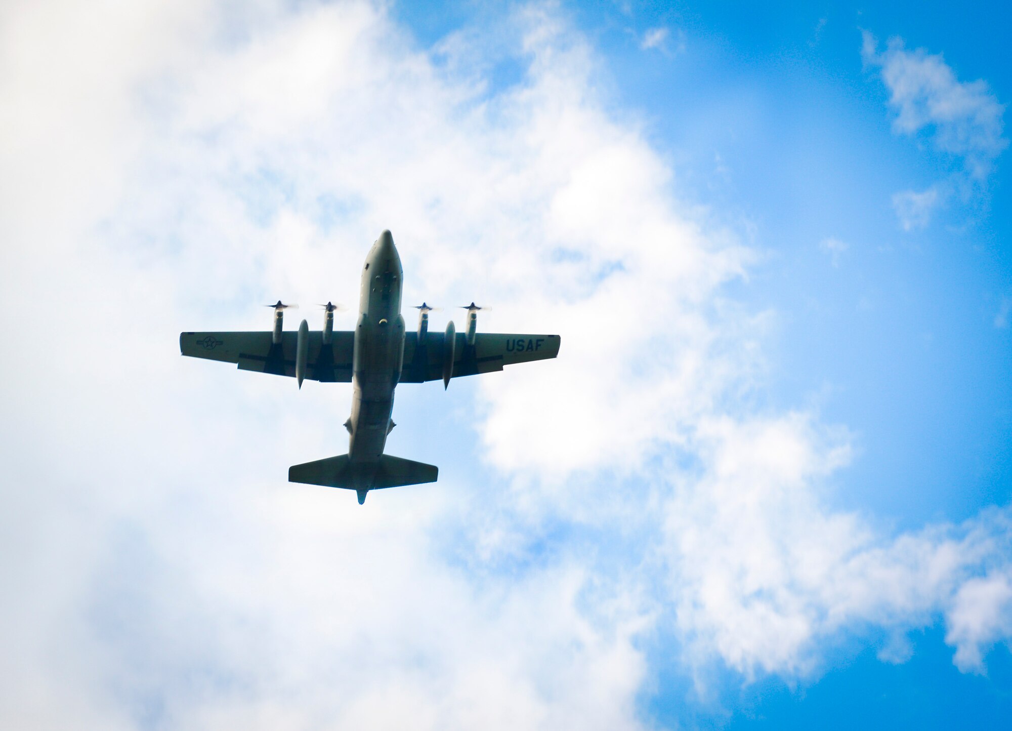 A C-130 Hercules assigned to the 36th Airlift Squadron flies over the air field at Yokota Air Base, Japan, Sep. 7, 2016. Yokota’s C-130 Hercules continue to conduct theater airlift in support of Pacific Command, which has been the 374th Airlift Wing’s primary mission since the mid-1970s. (U.S. Air Force Photo by Airman 1st Class Baker/Released)