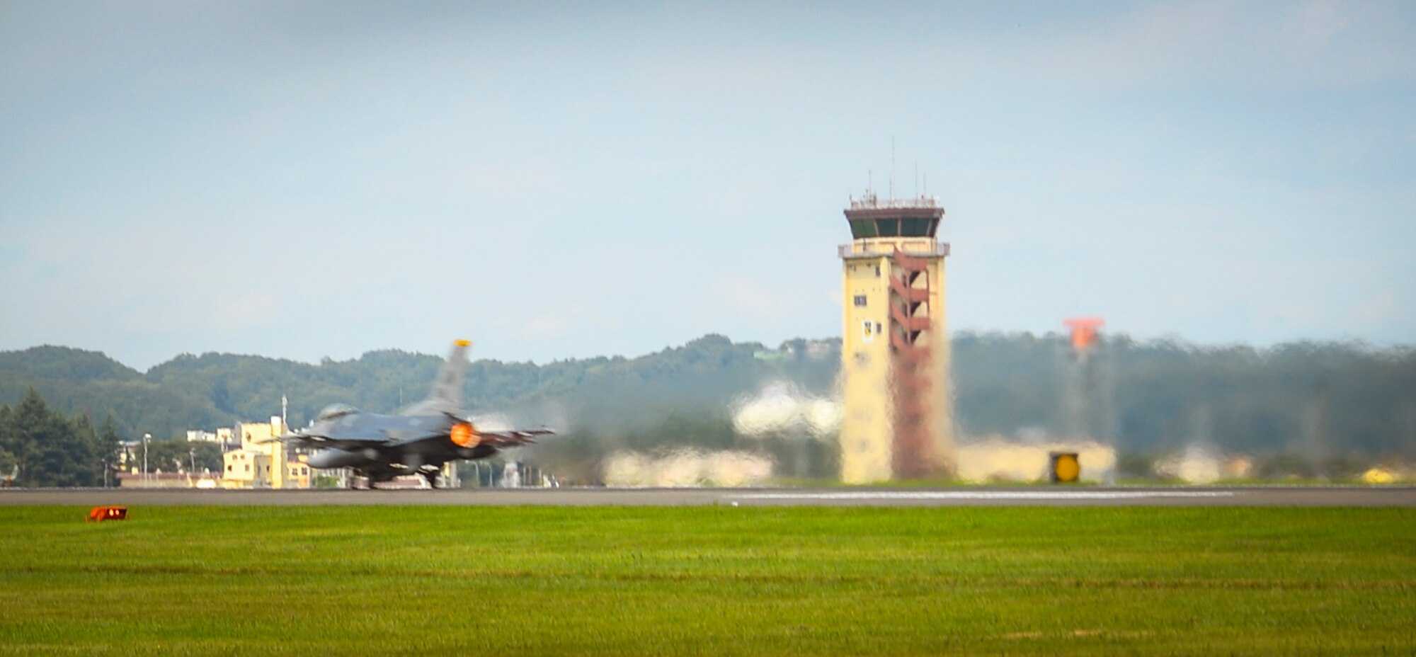 An F-16 Fighting Falcon assigned to the 35th Fighter Wing, Misawa Air Base, takes off at Yokota Air Base, Japan, Sep. 7, 2016. A number of Misawa aircraft stopped at Yokota for refueling before continuing their mission. (U.S. Air Force Photo by Airman 1st Class Baker/Released)