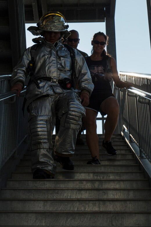 U.S. Marines, sailors and civilians joined together for a 9/11 Memorial Stair Climb at Marine Corps Air Station Iwakuni, Japan, Sept. 9, 2016. The stair climb honored the fallen firefighters who responded to the attacks on the World Trade Centers on Sept. 11, 2001. (U.S. Marine Corps photo by Lance Cpl. Aaron Henson)