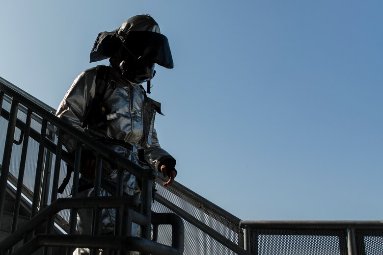 A U.S. Marine conducts a 9/11 Memorial Stair Climb at Marine Corps Air Station Iwakuni, Japan, Sept. 9, 2016. Participants climbed six floors multiple times for a total of 110 floors while empty handed or carrying a fire hose, simulated casualty or firefighting gear. Pictures lined the walls of the sixth floor to provide examples and visuals of the attacks. (U.S. Marine Corps photo by Lance Cpl. Aaron Henson)