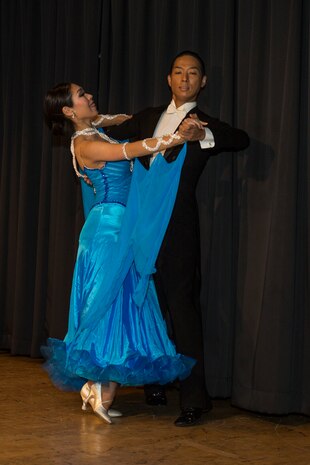 Naoko Kishi, left, and Yoshiharu Kishi, Japan Maritime Self-Defense Force amateur social dancers, perform a Waltz during the Iwakuni Expo at Marine Corps Air Station Iwakuni, Japan, Sept. 10, 2016. The Kishi Dancers also performed Latin dances and the Cha-Cha and Rumba during their performance. The expo provided residents a glimpse of the services that are available to them on and off the air station such as tourist destinations, shopping malls and local hotels. (U.S. Marine Corps photo by Lance Cpl. Aaron Henson)