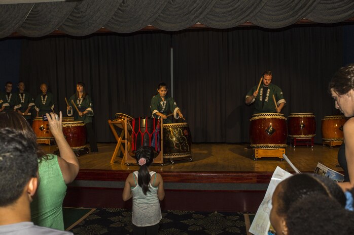 Marifu Daiko, a drumming group, performs a drum routine called ‘Warrior March’ during the Iwakuni Expo at Marine Corps Air Station Iwakuni, Japan, Sept. 10, 2016. Marifu Daiko consists mostly of local Matthew C. Perry Elementary School and High School students, along with several residents from the air station. The expo provided residents a glimpse of the services that are available to them on and off the air station such as tourist destinations, shopping malls and local hotels. (U.S. Marine Corps photo by Lance Cpl. Aaron Henson)