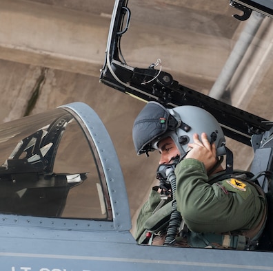 U.S. Air Force 1st Lt. James Chambers, a 67th Fighter Squadron (FS) pilot, conducts pre-flight preparations at Kadena Air Base, Japan, Sept. 9, 2016. The 67th FS prepared more than 20 F-15s to support Exercise Valiant Shield in Guam. (U.S. Air Force photo by Senior Airman Lynette M. Rolen)
