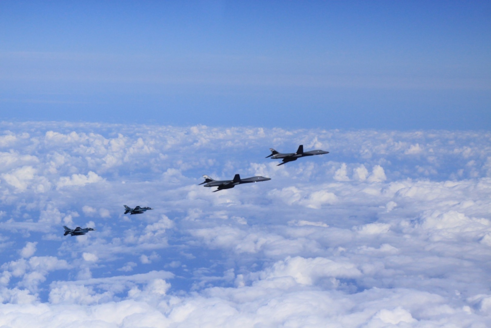 OSAN AIR BASE, Republic of Korea -- Today, two U.S. Air Force B-1B strategic bombers from Andersen Air Force Base, Guam, conducted training with fighter aircraft from the Japan Air Self Defense Force (JASDF) and a low-level flight with fighter aircraft from the Republic of Korea (ROK) and the United States, in response to the recent nuclear test by North Korea.  (Courtesy Photo by U.S. Forces Korea/Released)