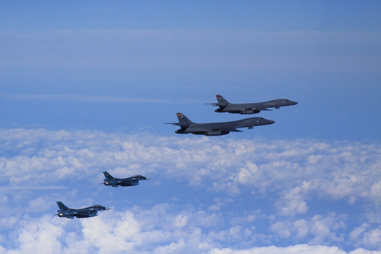 OSAN AIR BASE, Republic of Korea -- Today, two U.S. Air Force B-1B strategic bombers from Andersen Air Force Base, Guam, conducted training with fighter aircraft from the Japan Air Self Defense Force (JASDF) and a low-level flight with fighter aircraft from the Republic of Korea (ROK) and the United States, in response to the recent nuclear test by North Korea.  (Courtesy Photo by U.S. Forces Korea/Released)