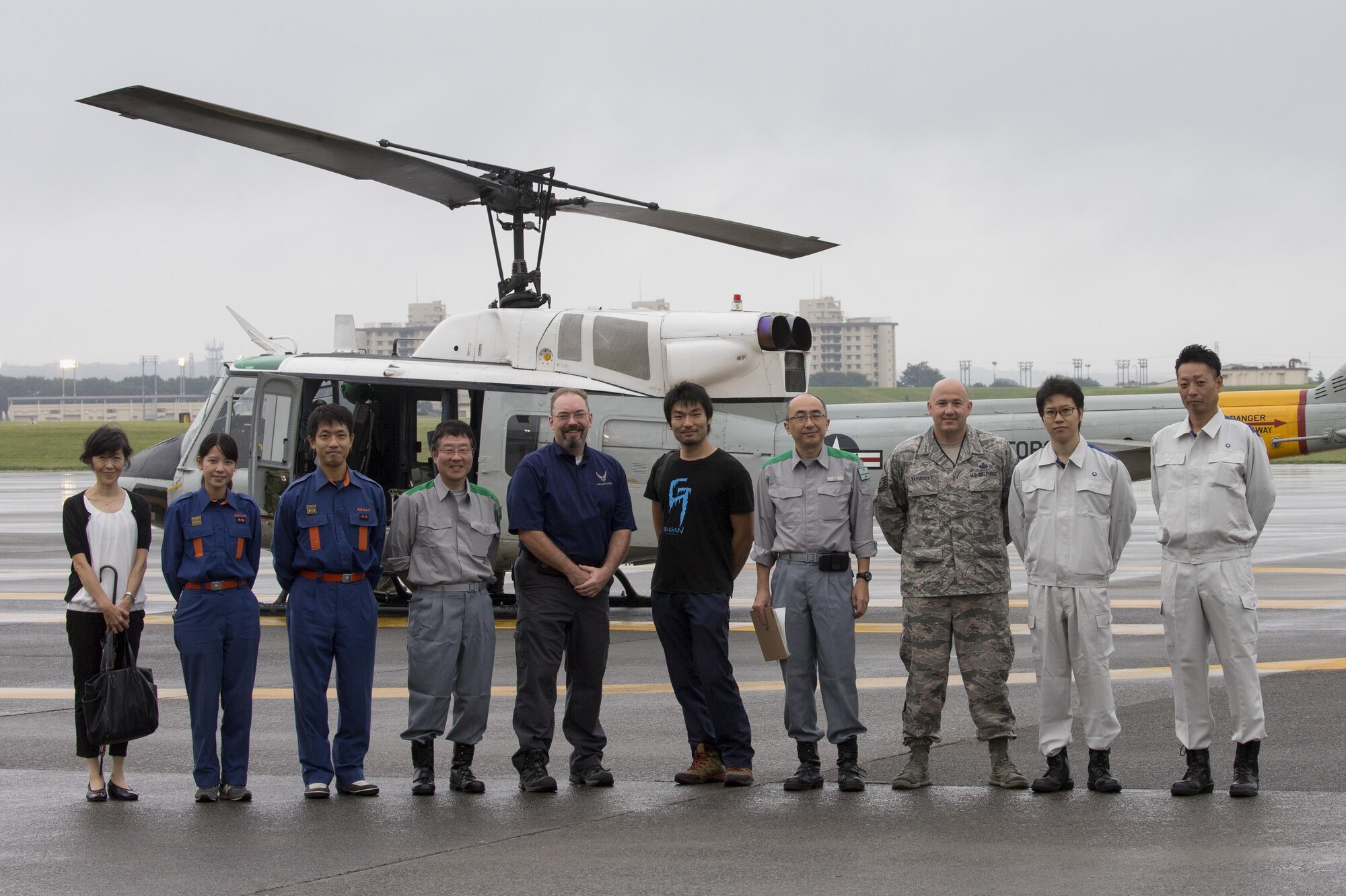 Members with the Tokyo Metropolitan Government, Fussa Red Cross, Musashimurayama City hall, and Airmen with the 374th Airlift Wing pose for a photo at Yokota Air Base, Japan, Sept. 4, 2016, during the Annual Tokyo Metropolitan Government Disaster Management Drill. Airmen with the 459 AS delivered simulated disaster relief supplies to the Tokyo Rinkai Disaster Prevention Park during annual Tokyo Metropolitan Government Disaster Management Drill. The park is located in the Ariake area and is a disaster countermeasure headquarters of the Government of Japan and other local governments during large-scale earthquakes in the metropolitan area. U.S. Air Force photo by Yasuo Osakabe/Released)    