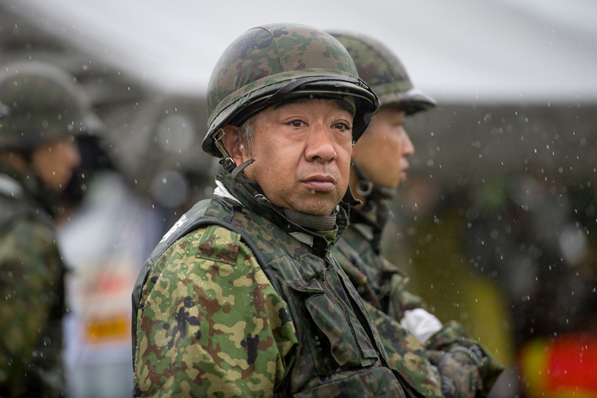 A Japan Ground Self-Defense Force soldier participates in a simulated emergency during the Kanagawa Prefecture Government Joint Disaster Drill at JGSDF Camp Takeyama, Sept. 11, 2016. Members of the U.S. Armed Forces, Japan Self-Defense Force and local emergency response teams spent the day working side-by-side, responding to various simulated disaster scenarios. (U.S. Air Force photo by Senior Airman Delano Scott/Released)