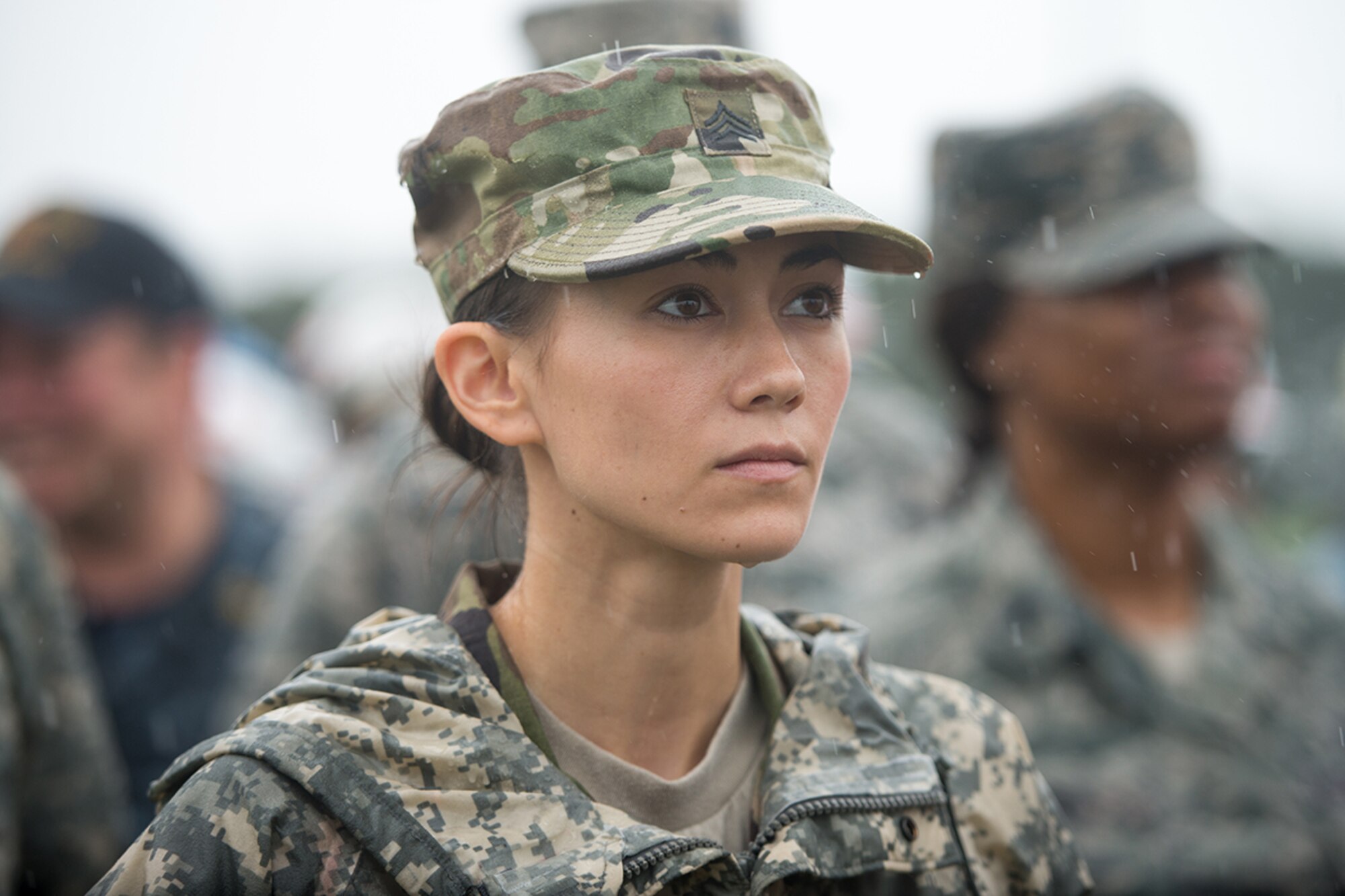 Army Sgt. Marlise Muenzer, 94th Combat Support Hospital medic, takes part in the closing ceremony of the Kanagawa Prefecture Government Joint Disaster Drill at Japan Ground Self-Defense Force Camp Takeyama, Japan, Sept. 11, 2016. The exercise provided an opportunity for U.S. Armed Force members to strengthen partnerships with the Japan Self-Defense Force. (U.S. Air Force photo by Senior Airman Delano Scott/Released)