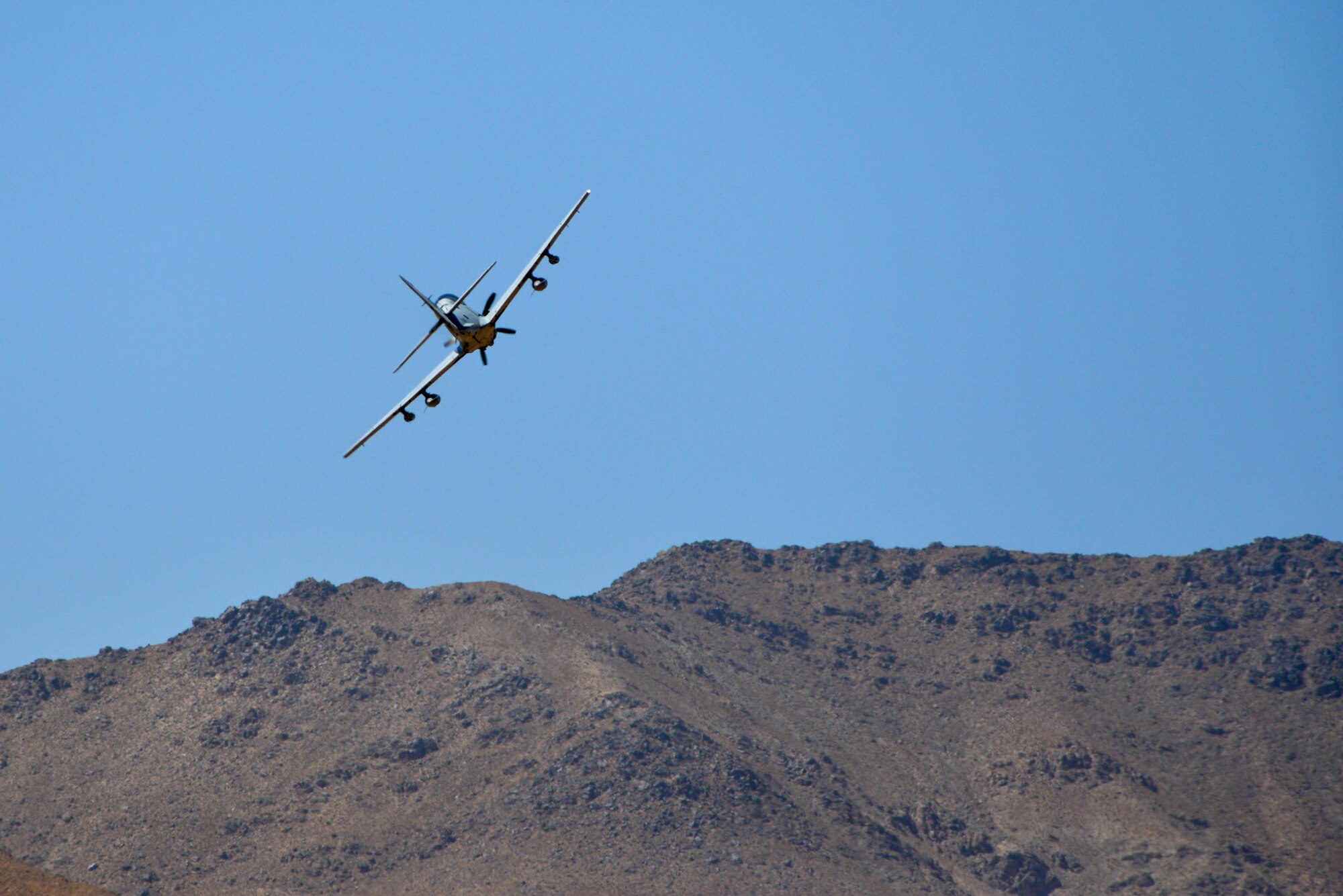 An Afghan air force A-29A Super Tucano fires weapons at a training target during a partnership exercise between Afghan Air Force pilots and U.S. Air Force personnel recovery forces near Kabul, Afghanistan, Sept. 6, 2016. Members of TAAC-Air, Special Mission Wing and the 83rd Expeditionary Rescue Squadron coordinated the training to give the pilots the experience and skill necessary to ensure their safe rescue and return home in the event they find themselves stranded during a mission. (U.S. Air Force photo by Tech. Sgt. Christopher Holmes)