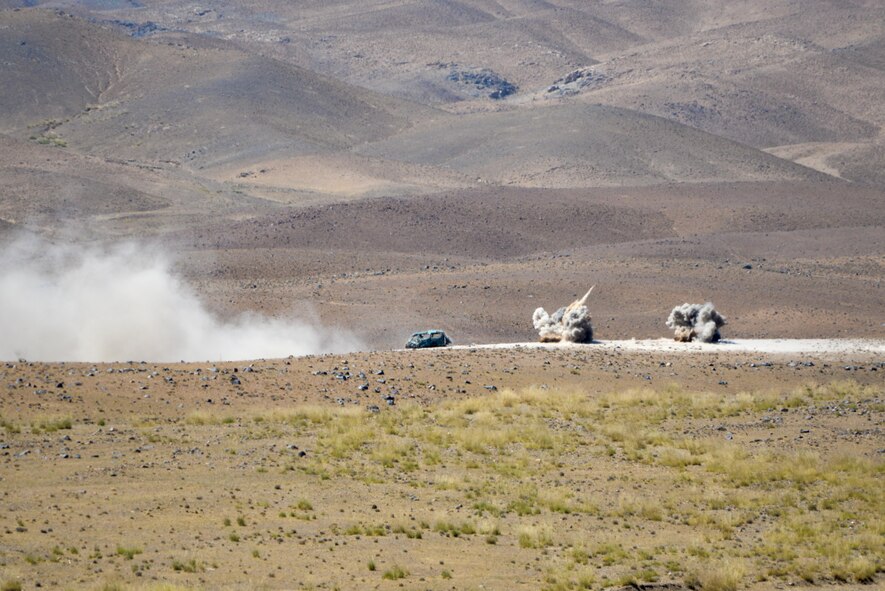 An Afghan Air Force A-29A Super Tucano fires weapons at a training target during a partnership exercise between Afghan Air Force pilots and U.S. Air Force personnel recovery forces near Kabul, Afghanistan, Sept. 6, 2016. Members of TAAC-Air, Special Mission Wing and the 83rd Expeditionary Rescue Squadron coordinated the training to give the pilots the experience and skill necessary to ensure their safe rescue and return home in the event they find themselves stranded during a mission. (U.S. Air Force photo by Tech. Sgt. Christopher Holmes)