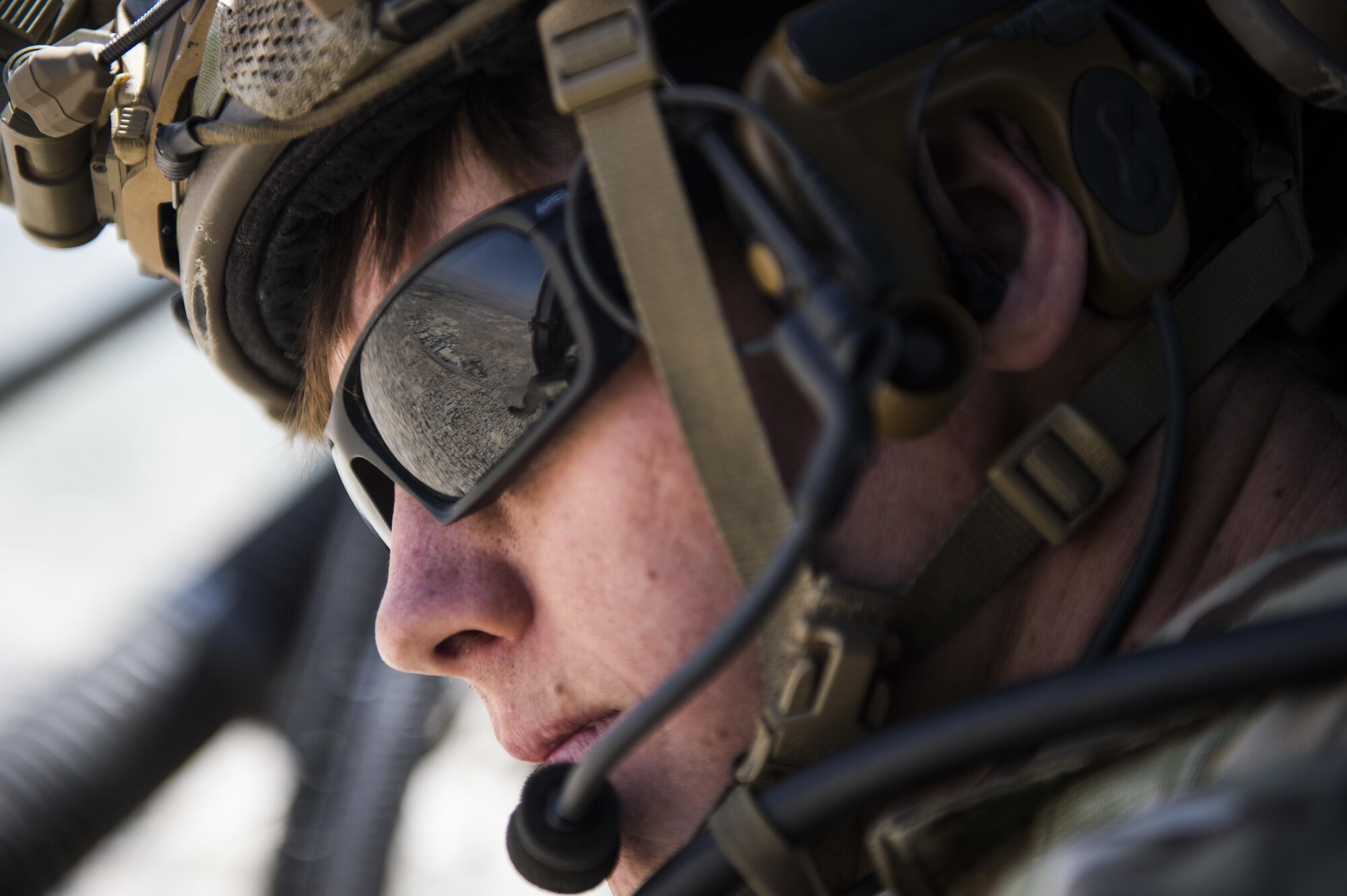 Senior Airman Ty Hatcher, a pararescueman assigned to the 83rd Expeditionary Rescue Squadron, watch over the city of Kabul as his HH-60 Pave Hawk flies over, September 6, 2016. Airmen from the 83rd ERQS, provided personnel recovery scenario training to the Afghan Air Force's A-29 pilots.
(U.S. Air Force photo/Tech. Sgt. Larry E. Reid Jr., Released)