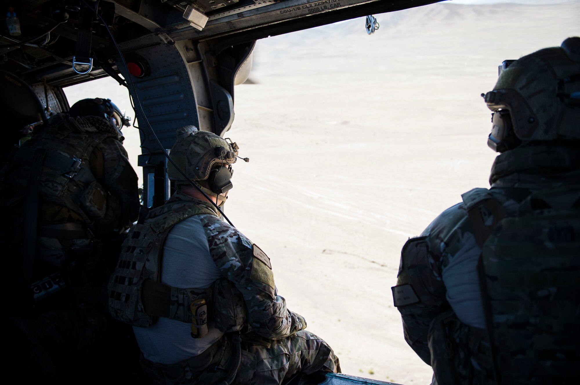 Pararescuemen assigned to the 83rd Expeditionary Rescue Squadron, look for a downed Afghan Air Fore pilot during a training mission near Kabul, Afghanistan, Sept. 6, 2016. Airmen from the 83rd ERQS, provided personnel recovery scenario training to the Afghan Air Force's A-29 pilots.
(U.S. Air Force photo/Tech. Sgt. Larry E. Reid Jr., Released)