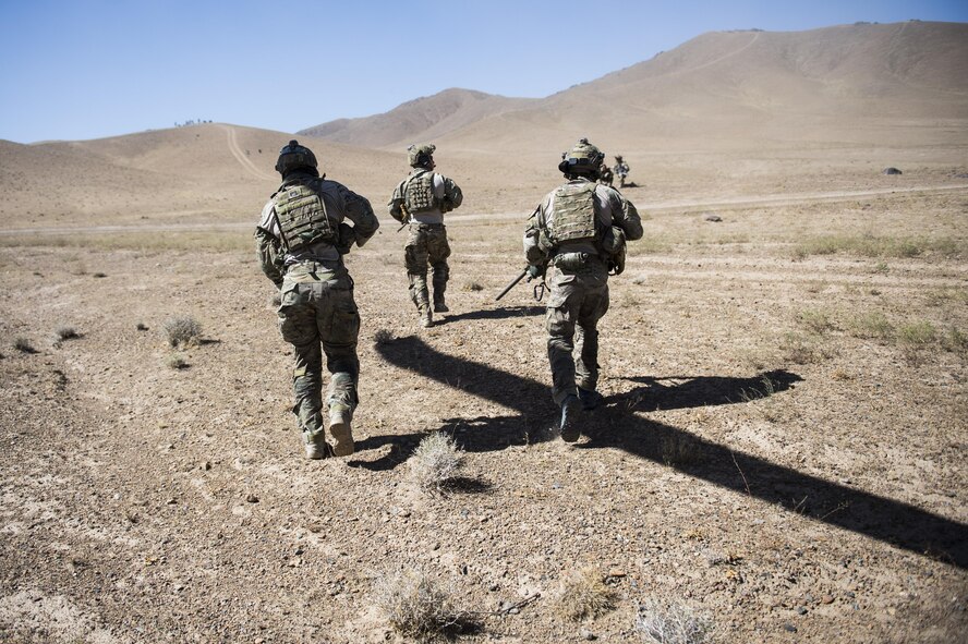 Pararescuemen assigned to the 83rd Expeditionary Rescue Squadron, approach a downed Afghan Air Force pilot during a training mission near Kabul, Afghanistan, Sept. 6, 2016. Airmen from the 83rd ERQS, provided personnel recovery scenario training to the Afghan Air Force's A-29 pilots.
(U.S. Air Force photo/Tech. Sgt. Larry E. Reid Jr., Released)