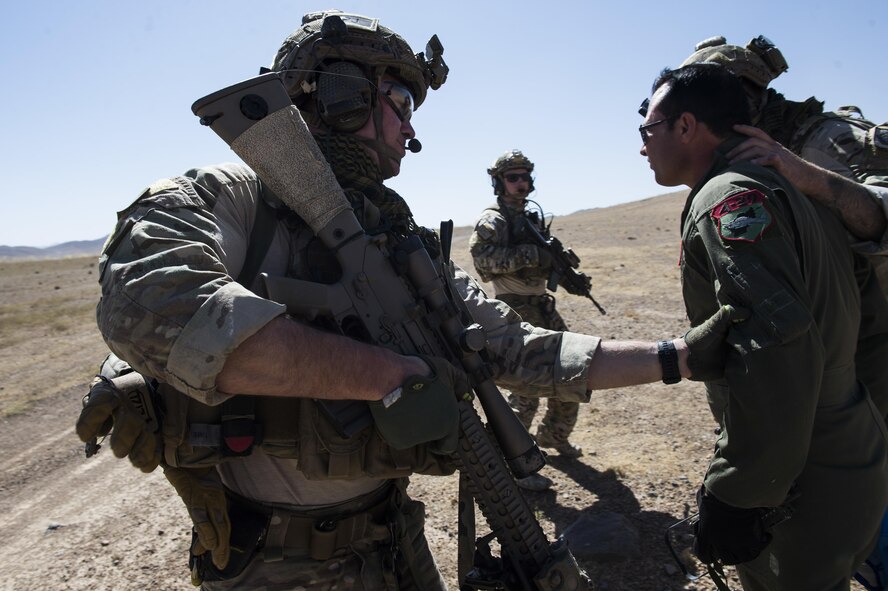 Pararescuemen assigned to the 83rd Expeditionary Rescue Squadron, recover a downed Afghan Air Force pilot during a training mission near Kabul, Afghanistan, Sept. 6, 2016. Airmen from the 83rd ERQS, provided personnel recovery scenario training to the Afghan Air Force's A-29 pilots.
(U.S. Air Force photo/Tech. Sgt. Larry E. Reid Jr., Released)