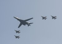 U.S. Air Force F-16 Fighting Falcons assigned to the 36th Fighter Squadron escort a U.S. Air Force B-1B Lancer from Andersen Air Force Base, Guam, during a flyover over Osan Air Base, Republic of Korea, Sept. 13, 2016. The B-1 is capable of rapidly delivering massive quantities of precision and non-precision weapons against any adversary, anywhere in the world, at any time. (U.S. Air Force photo by Victor J. Caputo)