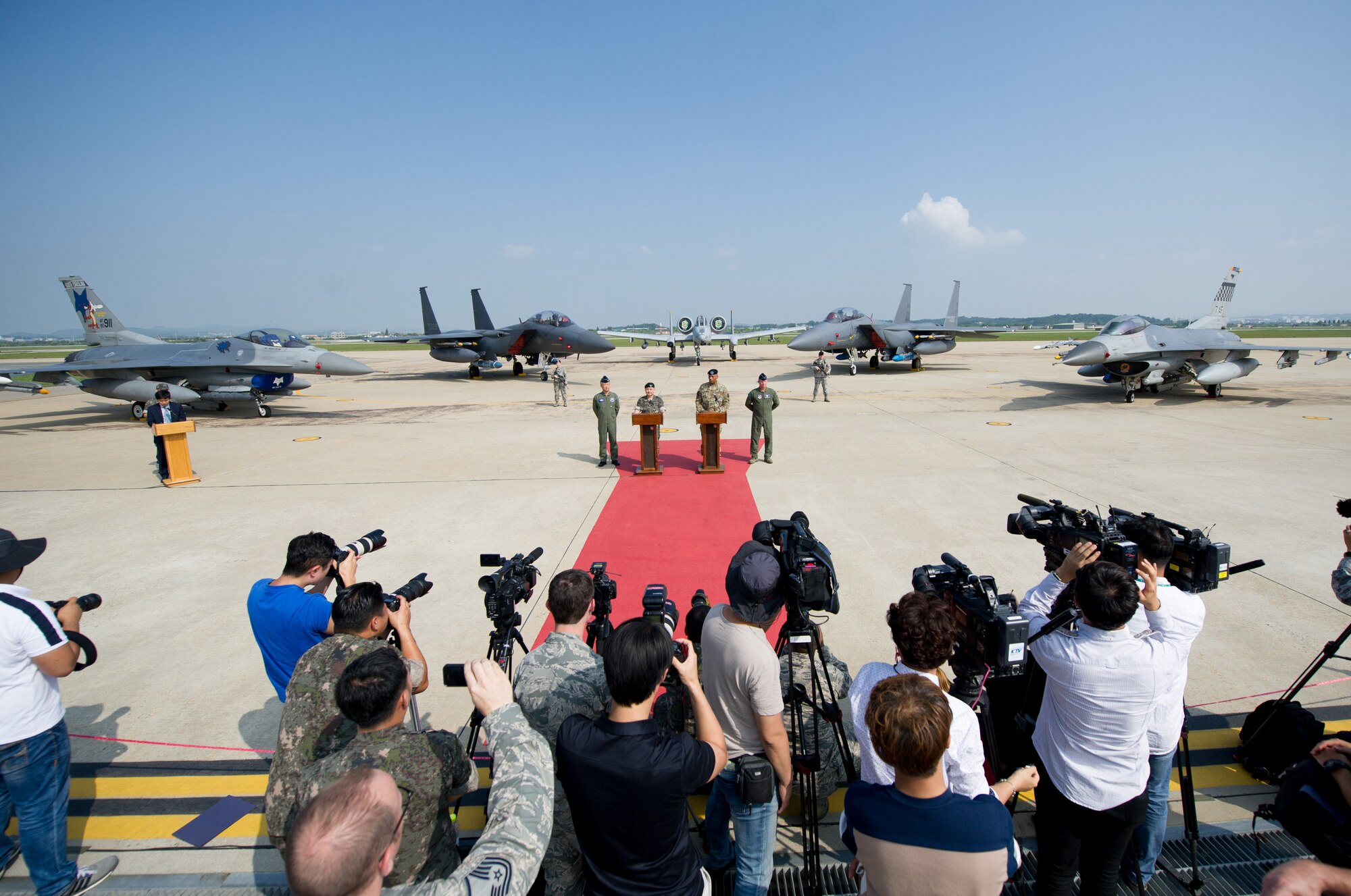 Republic of Korea army Gen. Lee, Sun Jin, Chairman of the Republic of Korea Joint Chiefs of Staff, and U.S. Army Gen. Vincent K. Brooks, U.S. Forces Korea commander, speak during a press conference following a flyover in response to recent provocative action by North Korea, Sept. 13, 2016, at Osan Air Base, ROK. Two U.S. Air Force B-1B Lancers from Andersen Air Force Base, Guam, were joined by Republic of Korean F-15K Slam Eagles and U.S. Air Force F-16 Fighting Falcons during the flyover. The close military cooperation between the U.S. and ROK keeps us ready to respond at any time to those who would threaten stability and security. (U.S. Air Force photo by Staff Sgt. Jonathan Steffen)