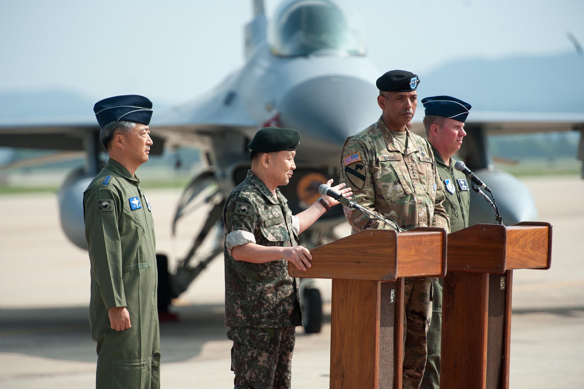 From the left: Republic of Korea air force Lt. Gen. Lee, Wang Keun, Republic of Korea Air Forces Operations Center commander, Republic of Korea army Gen. Lee, Sun Jin, Chairman of the Republic of Korea Joint Chiefs of Staff, U.S. Army Gen. Vincent K. Brooks, U.S. Forces Korea commander, and U.S. Air Force Lt. Gen. Thomas Bergeson, 7th Air Forces commander, represent the U.S. – ROK alliance during a press conference following a flyover in response to recent provocative action by North Korea, Sept. 13, 2016, at Osan Air Base, ROK. Two U.S. Air Force B-1B Lancers from Andersen Air Force Base, Guam, were joined by Republic of Korean F-15K Slam Eagles and U.S. Air Force F-16 Fighting Falcons during the flyover. The close military cooperation between the U.S. and ROK keeps us ready to respond at any time to those who would threaten stability and security. (U.S. Air Force photo by Staff Sgt. Jonathan Steffen)