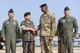 Republic of Korea army Gen. Lee, Sun Jin, Chairman of the Republic of Korea Joint Chiefs of Staff, shakes hands with U.S. Army Gen. Vincent K. Brooks, U.S. Forces Korea commander, as Republic of Korea air force Lt. Gen. Lee, Wang Keun, Republic of Korea Air Forces Operations Center commander, and U.S. Air Force Lt. Gen. Thomas W. Bergeson, 7th Air Force commander, stand by at the conclusion of a press conference following a flyover in response to recent provocative action by North Korea, Sept. 13. 2016, at Osan Air Base, ROK. Two U.S. Air Force B-1 Lancers from Andersen Air Force Base, Guam, were joined by Republic of Korean F-15K Slam Eagles and U.S. Air Force F-16 Fighting Falcons during the flyover. The close military cooperation between the U.S. and ROK keeps us ready to respond at any time to those who would threaten stability and security. (U.S. Air Force photo by Tech. Sgt. Rasheen Douglas)