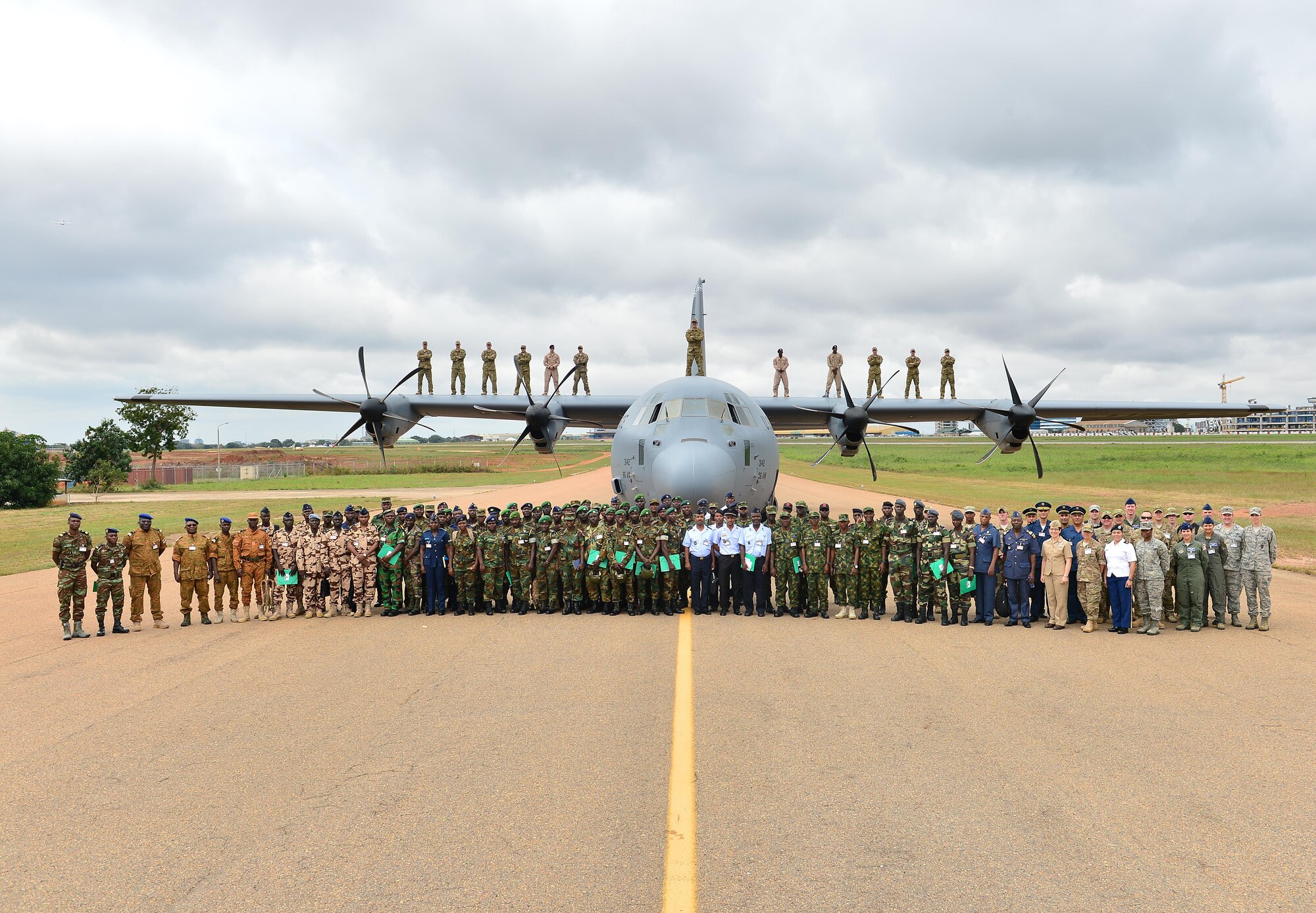African Partnership Flight participants pose in front of an C-130J Super Hercules for a group photo Sept. 12, 2016. Twelve West African counties are participating in APF Ghana, the focus of this APF is expeditionary air base buildup. (U.S. Air Force photo by Staff Sgt. Stephanie Longoria)