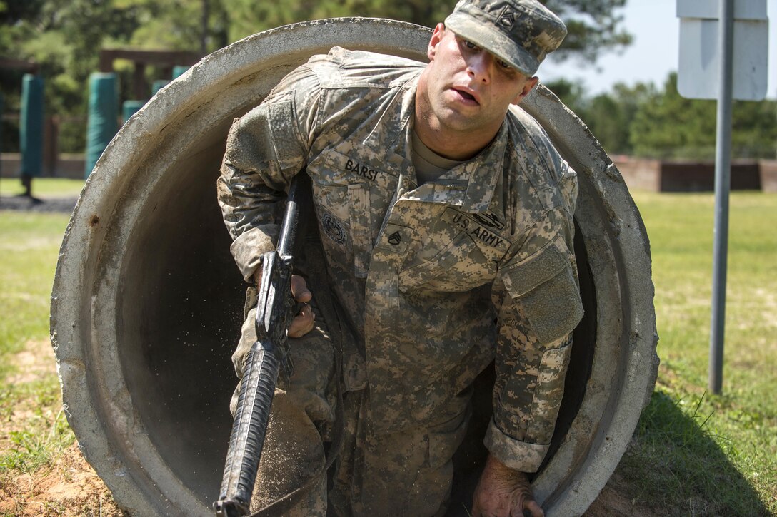 Army Staff Sgt. Daniel Barsi completes the culvert obstacle course during the Army Reserve Drill Sergeant of the Year competition at Fort Jackson, S.C., Sept. 8, 2016. Barsi is assigned to Fort Jackson, S.C. Army photo by Sgt. 1st Class Brian Hamilton