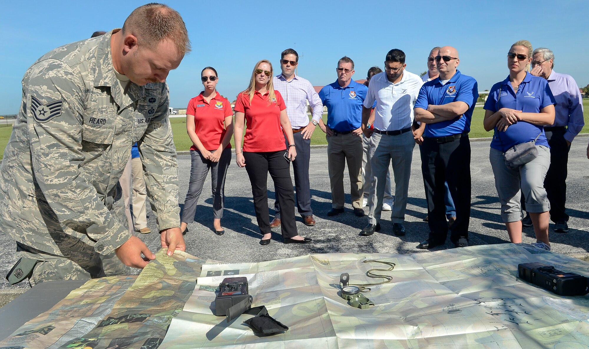 Staff Sgt. Benjamin Heard, a survival, evasion, resistance and escape specialist with the 6th Operations Support Squadron, briefs honorary commanders on survival skills during the 6th Operations Group immersion, Sept. 9, 2016, at MacDill Air Force Base, Fla. This event allows Team MacDill to share experiences and learn from members of the local community. (U.S. Air Force photo by Senior Airman Jenay Randolph)
