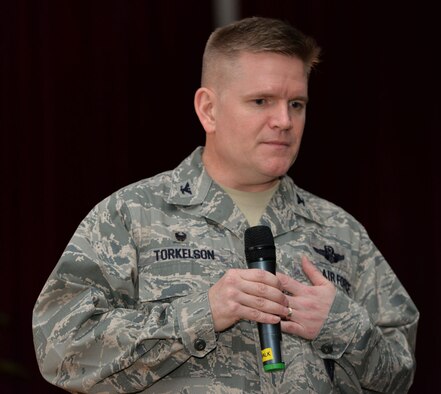 U.S. Air Force Col. Thomas D. Torkelson, 100th Air Refueling Wing Commander, talks to the audience at an event, on RAF Mildenhall, England. During 9/11, Torkelson was a Captain serving as a flight commander in the 909th Air Refueling Squadron at Kadena Air Base, Japan. (U.S. Air Force photo by Karen Abeyasekere)