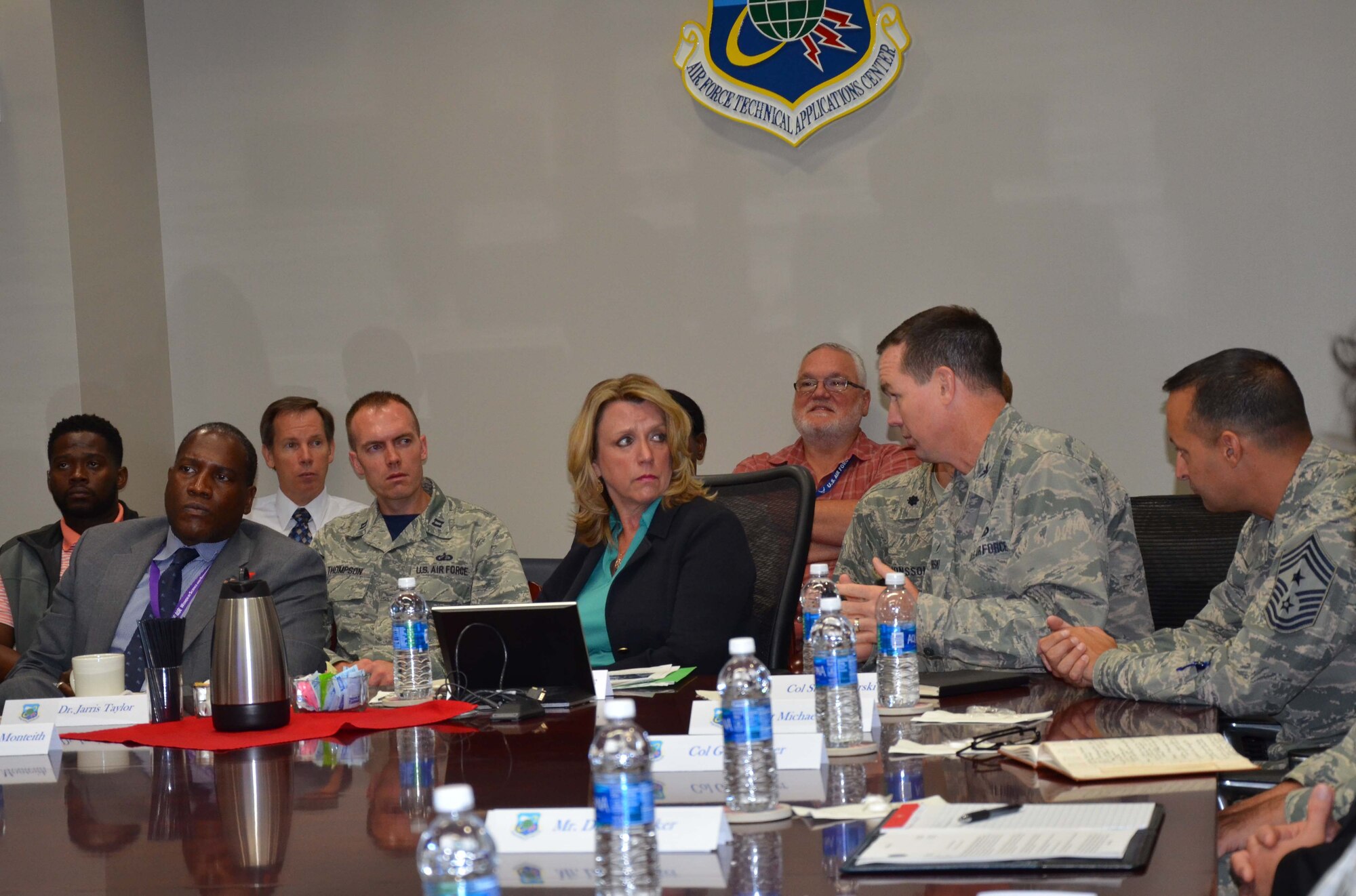 160909-SR919-001 -- Secretary of the Air Force Deborah Lee James listens to Col. Steven M. Gorski, commander of the Air Force Technical Applications Center, discuss the actions AFTAC has taken with regard to North Korea's purported nuclear test Sept. 9, 2016.  James was visiting Patrick AFB, Fla., to witness the launch of an Atlas V rocket and took time out of her schedule to get briefed by Gorski and his nuclear treaty monitoring experts about how the center measures seismic activity and compliance with nuclear treaties. The secretary was also briefed about the capabilities of the WC-135 Constant Phoenix, AFTAC's atmospheric collection aircraft that has been deployed to the region to collect accurate information on levels of potential radiation in the area of concern.  Pictured at the table from left to right:  Dr. Jarris Taylor, James' deputy assistant on Strategic Diversity Integration, James, Gorski, and Chief Master Sgt. Michael Joseph, AFTAC's Command Chief.
(U.S. Air Force photo by Susan A. Romano)