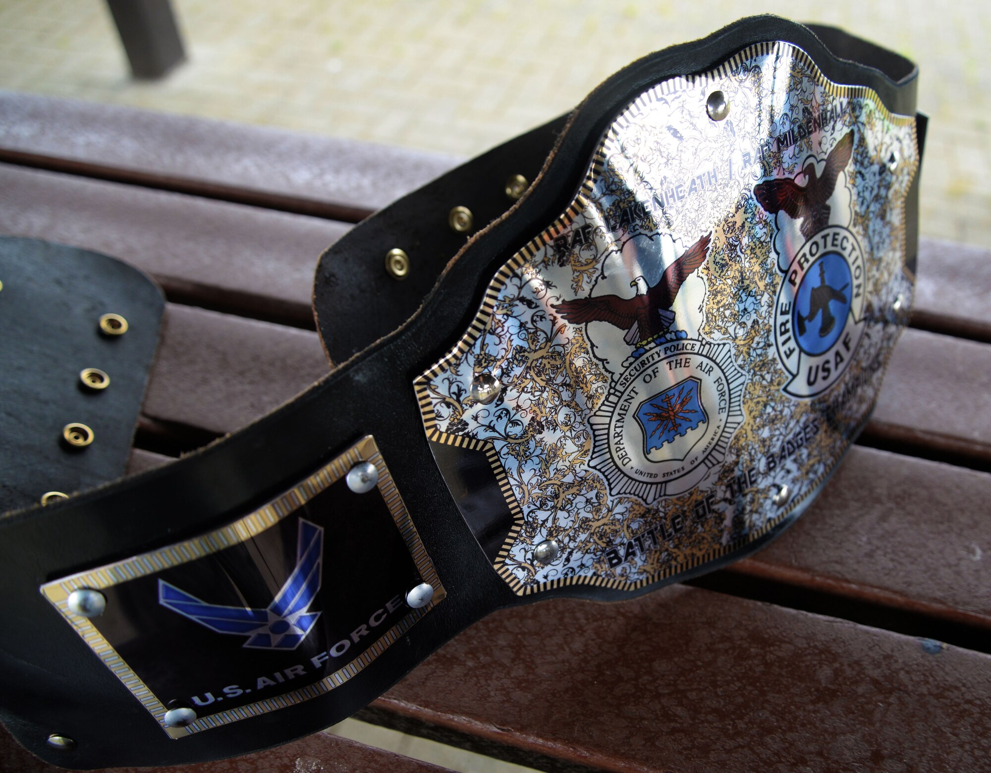 U.S. Air Force firefighters and defenders from the 48th Civil Engineer Squadron and the 48th Security Forces Squadron from RAF Lakenheath, compete in teamwork challenges against their counterparts from the 100th CES and the 100th SFS Sept. 7, 2016, on RAF Mildenhall, England. The Battle of the Badges competition highlights the camaraderie between the career fields and pays homage to the first responders who lost their lives on 9/11. (U.S. Air Force photo by Senior Airman Justine Rho)