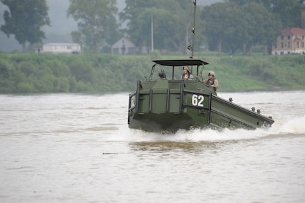 Soldiers with the Kentucky Army National Guard’s 2061st Multi-Role Bridge Company and the Fort Knox-based 502nd MRBC head down the Ohio River during operational testing of the XM30 Bridge Erection Boat, which is scheduled to replace the 30-year-old MK II BEB used during bridging operations across rivers and other bodies of water. Soldiers from the two units put the boat through its paces in a variety of mission essential tasks as a way to provide data in support of full production and fielding of the boat to bridging units. (Photo by Larry L. Furnace)