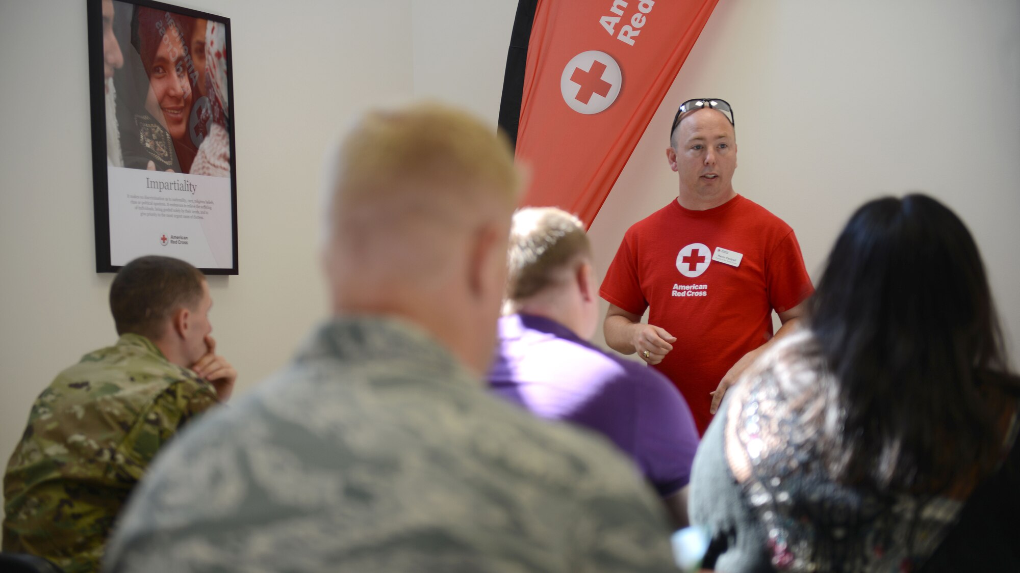 Kevin Cantrell, American Red Cross disaster cycle programs instructor volunteer, teaches an earthquake preparedness class held at the American Red Cross on base on Sept. 9, 2016. The class focused on history of disasters, safety and preparing disaster kits for emergencies. (U.S. Air Force photo by Staff Sgt. Andrew M. Satran/Released)