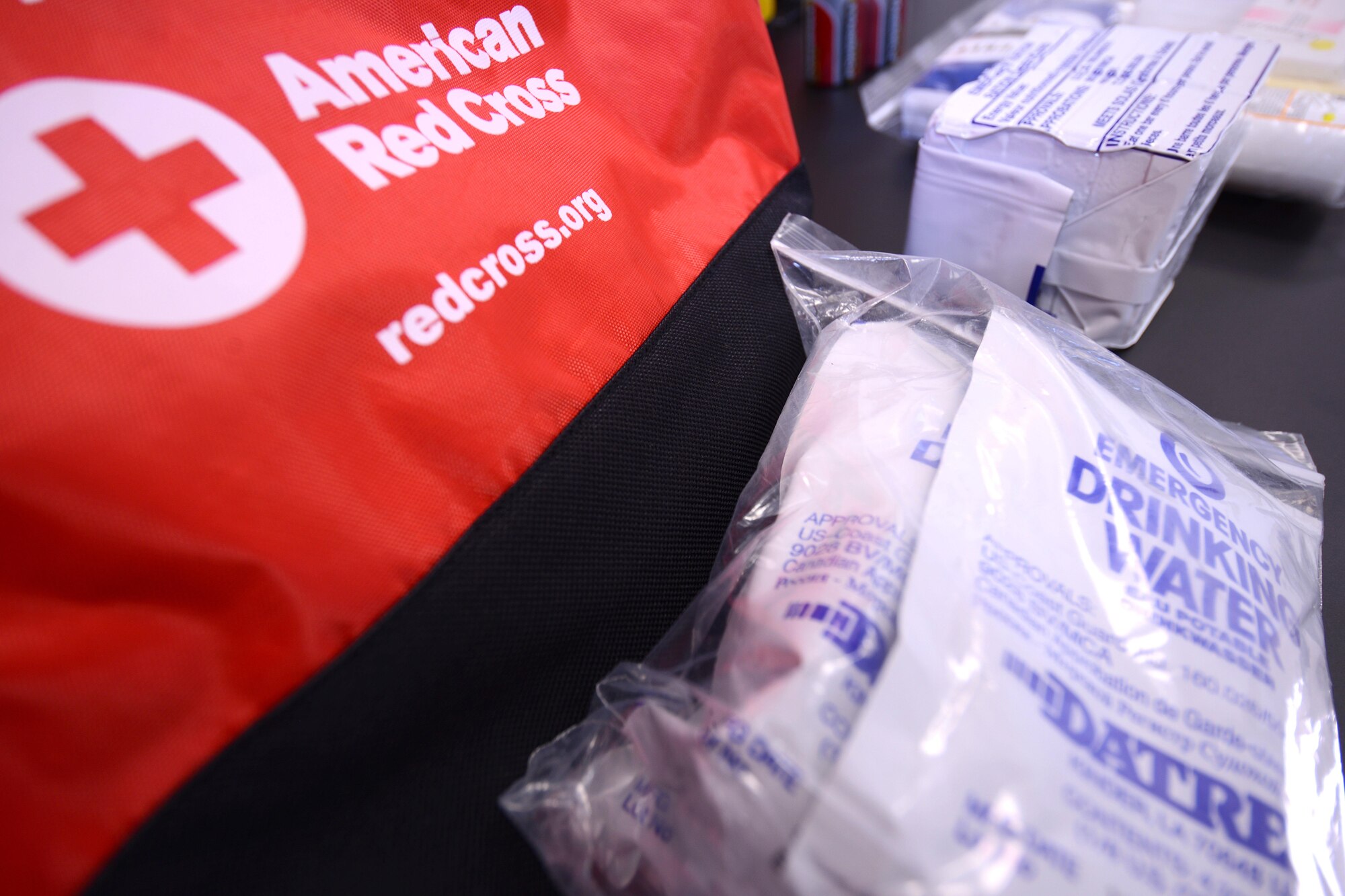 A static display of a disaster preparation kit is shown during an earthquake preparedness class at the American Red Cross on Aviano Air Base, Italy, Sept. 9, 2016. The American Red Cross is spreading the word for disaster preparation month. They are offering a variety of training classes to keep Team Aviano safe and informed. (U.S. Air Force photo by Staff Sgt. Andrew M. Satran/Released)
