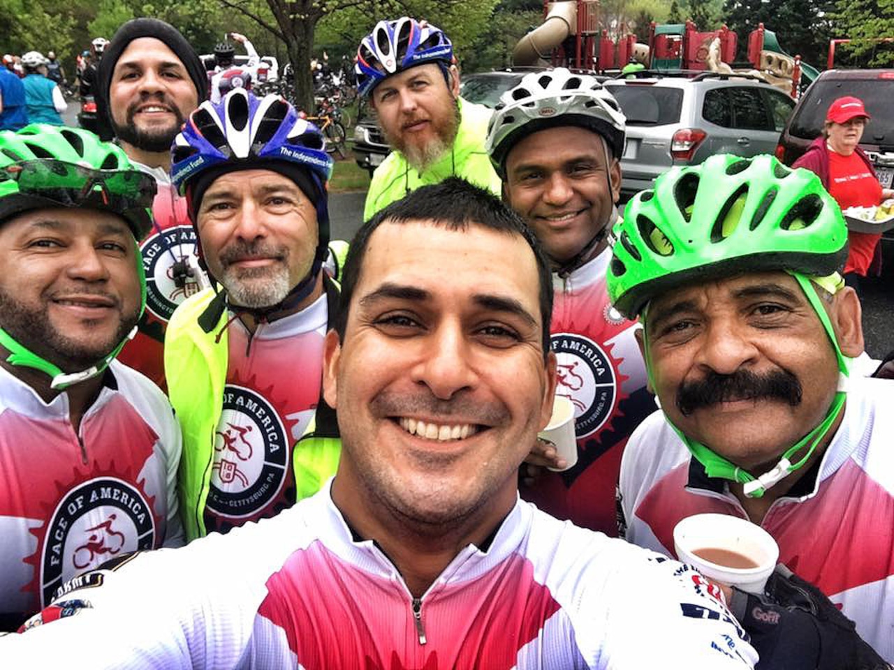 Army veteran Sgt. Norberto Roman stops to take a photo with his teammates before taking on the two-day, 110-mile Face of America bike ride from Arlington, Va., to Gettysburg, Pa., April 25-26, 2015. Courtesy photo