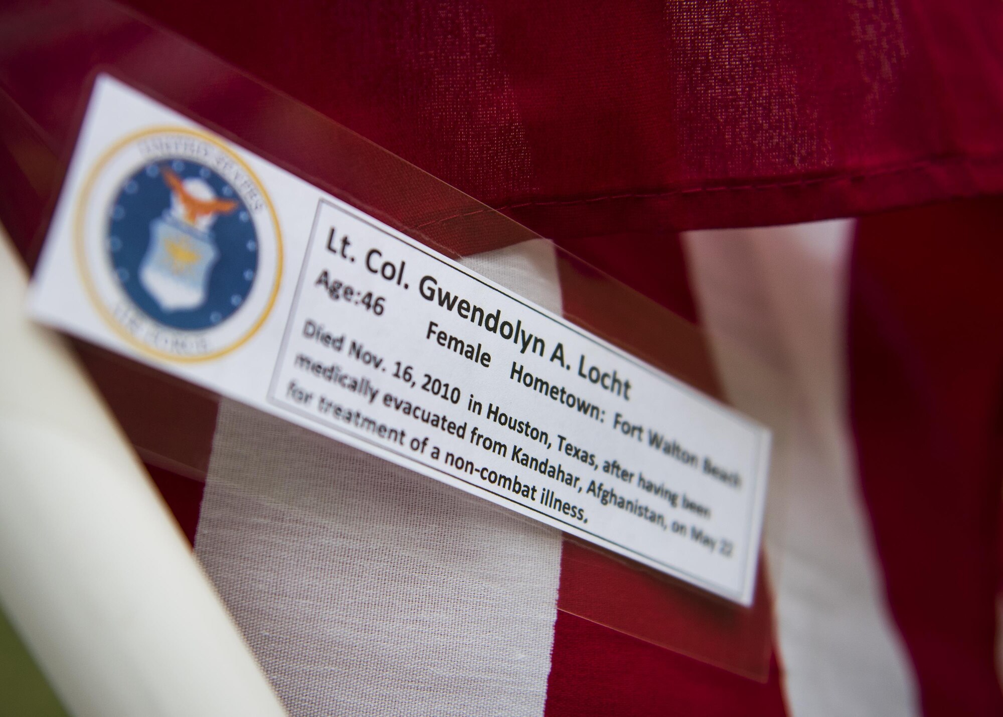 Lt. Col. Gwendolyn Locht’s, a Fort Walton Beach native, name was attached to one of the flags set up on the Field of Valor display in Niceville, Fla. Sept. 12. The display features 13 rows of 27 flags and one extra to create the field. Names of recently fallen military members, including 10 Airmen, adorn each of the approximately 352 American flags. The Field will be on display through Sept. 17 at the Mullet Festival grounds and is free to the public. (U.S. Air Force photo/Samuel King Jr.) 