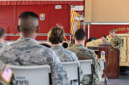 U.S. Army Col. Brian Hughes, Joint Task Force-Bravo commander, speaks during the 9/11 remembrance ceremony at Soto Cano Air Base, Honduras, Sept. 9, 2016. During his speech, Hughes encouraged JTF-Bravo service members to reflect upon the actions taken by the fallen heroes of that fateful day 15 years ago.