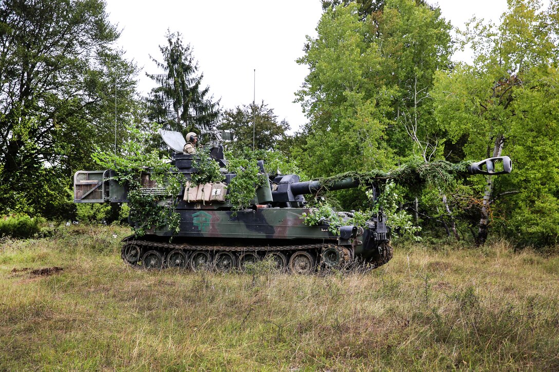 Soldiers observe their sector of fire in a M109A6 Paladin howitzer during exercise Combined Resolve VII at Hohenfels, Germany, Sept. 4, 2016. Army photo by Sgt. Matthew Hulett