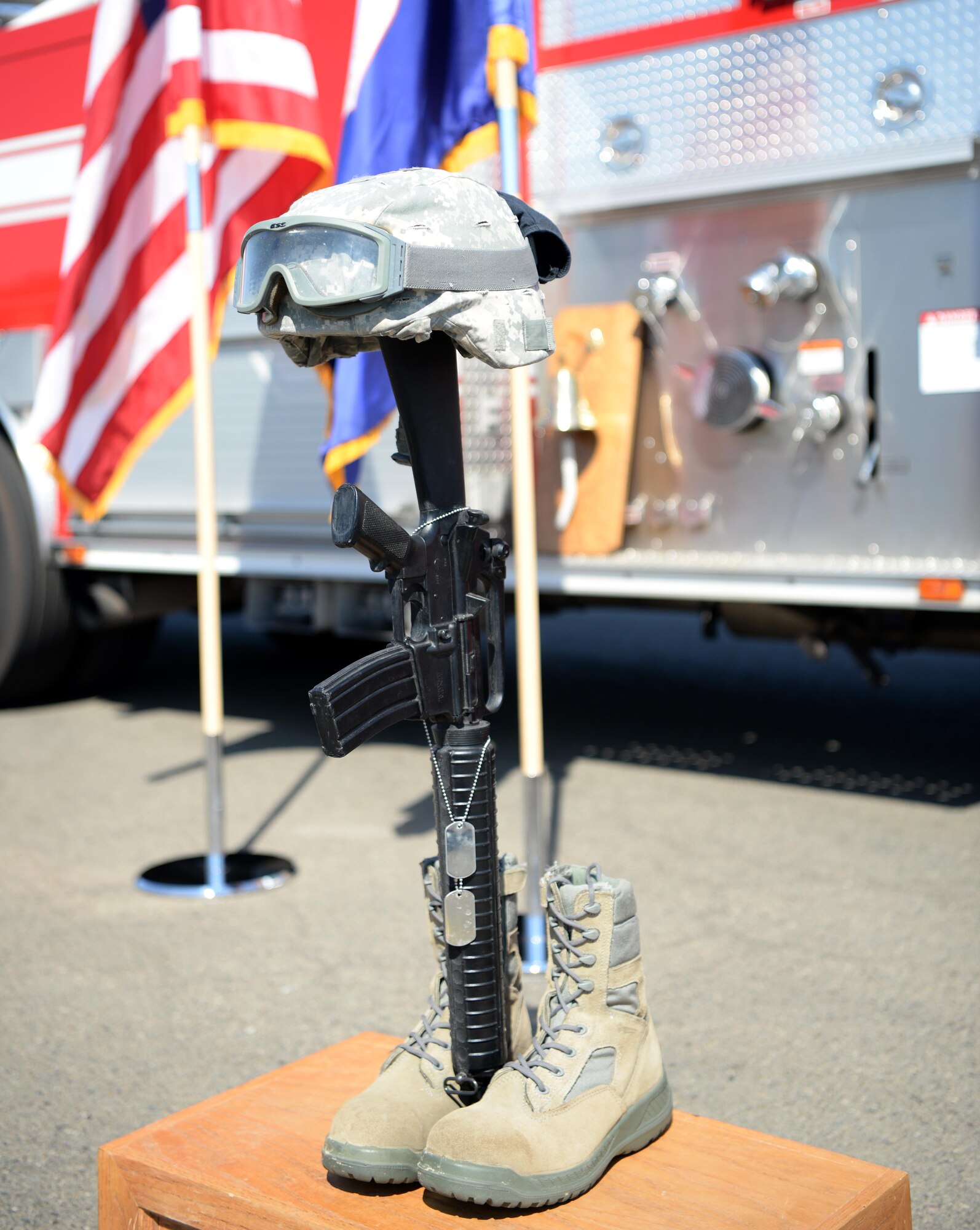 A pair of boots and a rifle stand a reminder of those lost in the wars since 9/11 Sept. 9, 2016, at Beale Air Force Base, California. Beale held a 9/11 first responder memorial ceremony to honor the firefighters, police officers, and medical responders who responded to the event. (U.S Air Force photo/ Tristan D. Viglianco)