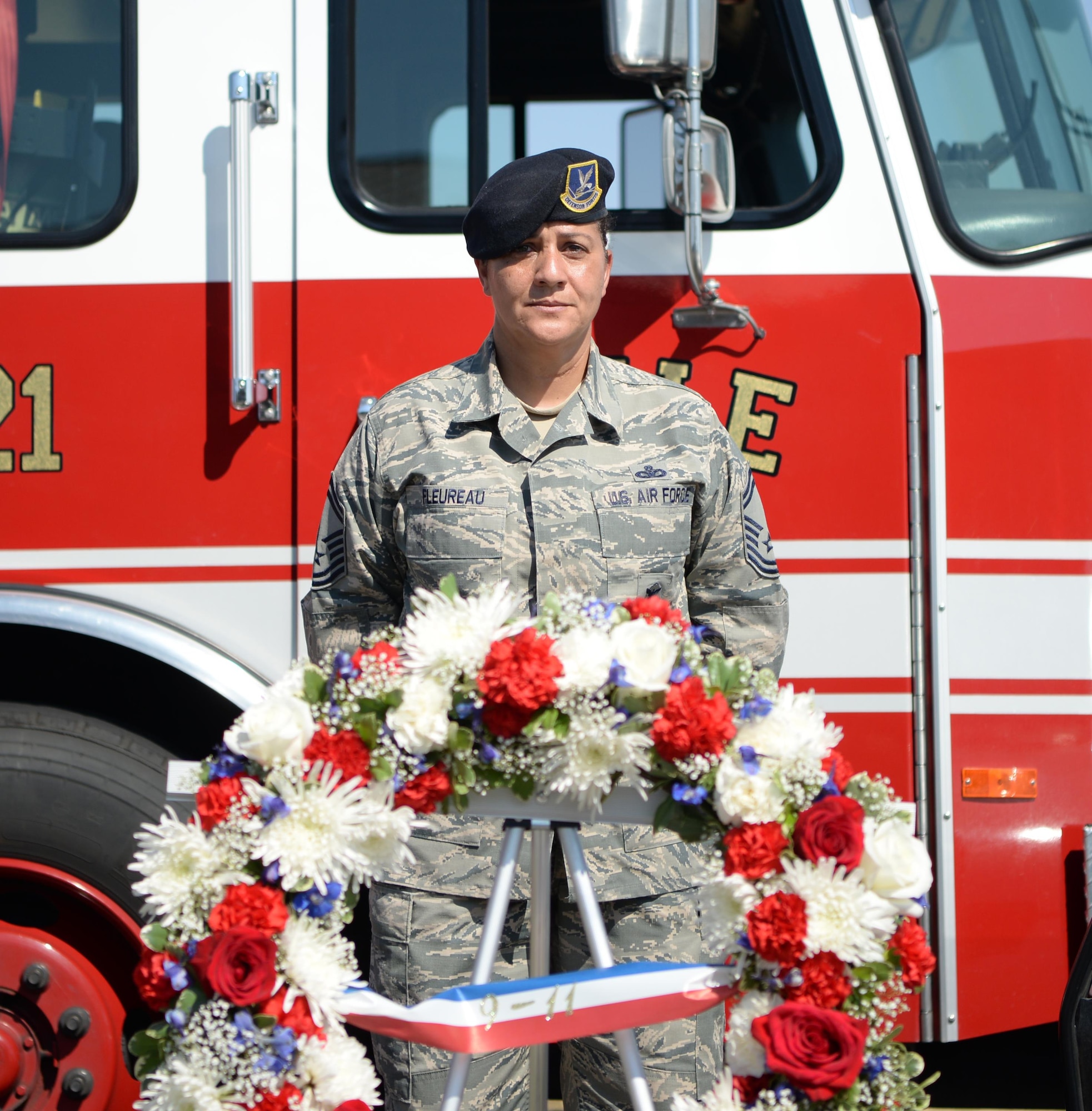 Senior Master Sgt. Bea Fleureau, 9th Security Forces Squadron operations superintendent, presides over a wreath laying Sept. 9, 2016, at Beale Air Force Base, California. The upcoming anniversary of 9/11 marks 15 years since the attacks. (U.S Air Force photo/ Tristan D. Viglianco)