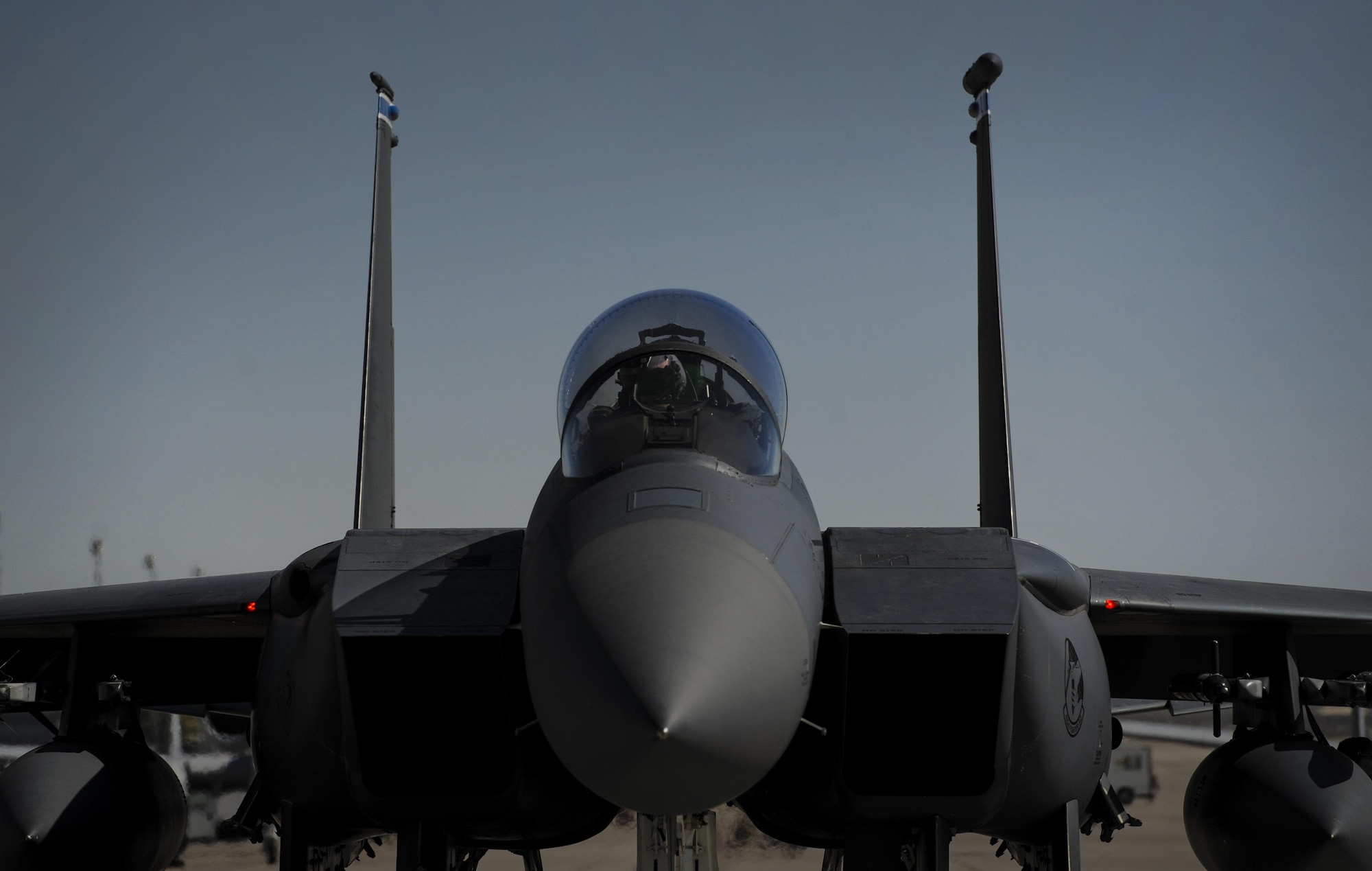 A pilot with the 492nd Fighter Squadron, Royal Air Force Lakenheath, England, prepares an F-15E Strike Eagle prior to takeoff Green Flag 16-09 at Nellis Air Force Base, Nev., Sept. 9, 2016. The 492nd FS is participating with other U.S. military branches and allies in a large scale air-to-surface exercise at held on the National Training Center Fort Irwin, Calif. (U.S. Air Force photo by Airman 1st Class Kevin Tanenbaum/Released)