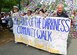 Virginia Beach Mayor, Will Sessoms and volunteers lead the Out of the Darkness Community Walk with honor at Mount Trashmore Park, Virginia Beach, Va., Sept. 10, 2016.  Participants walked 4,097 steps to celebrate, honor and remember victims of suicide. (U.S. Air Force photo by Tech. Sgt. Daylena S. Ricks)  