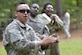 U.S. Army Sgt. Juan Gonzales, 155th Inland Cargo Transport Company cargo specialist, cheers on fellow company members as they complete the obstacle course at Joint Base Langley-Eustis, Va., Sept. 8, 2016.  Gonzales was the NCO in charge of the event, and setup the parameters for obstacle completion safety. (U.S. Air Force photo by Staff Sgt. Natasha Stannard)