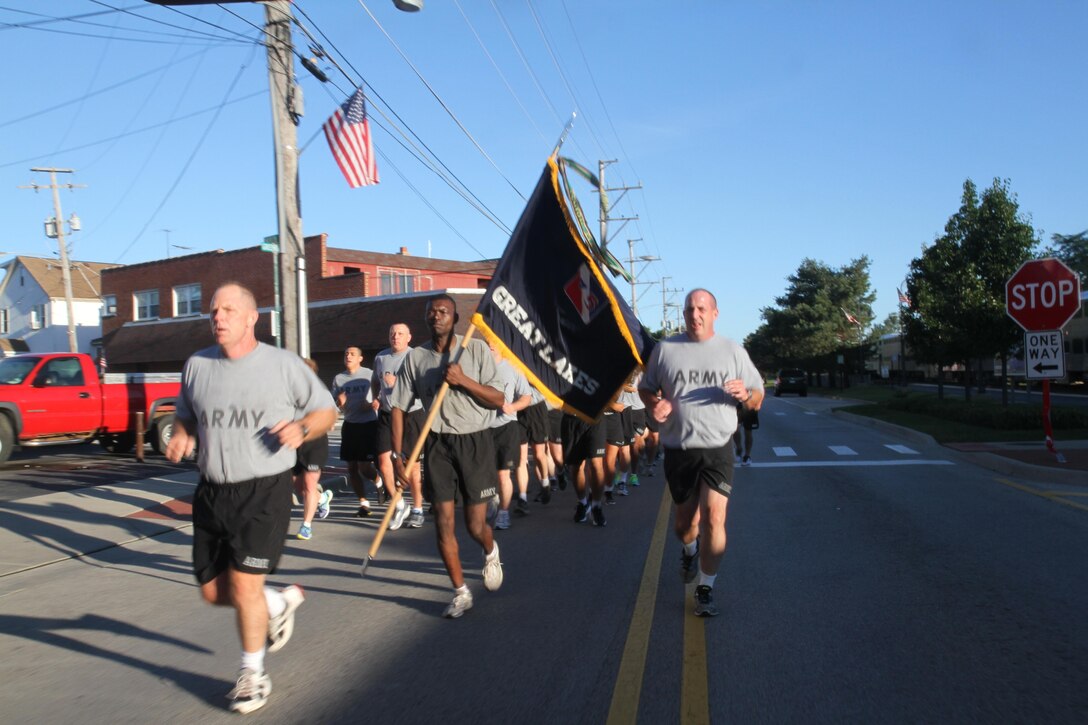 FORT SHERIDAN, Ill. - Army Reserve Brig. Gen. John Hussey from 75th Training Command leads the 9/11 Remembrance 5K run, Sunday, September 11, 2016 in Fort Sheridan. During the run, soldiers and civilians sing military cadences.