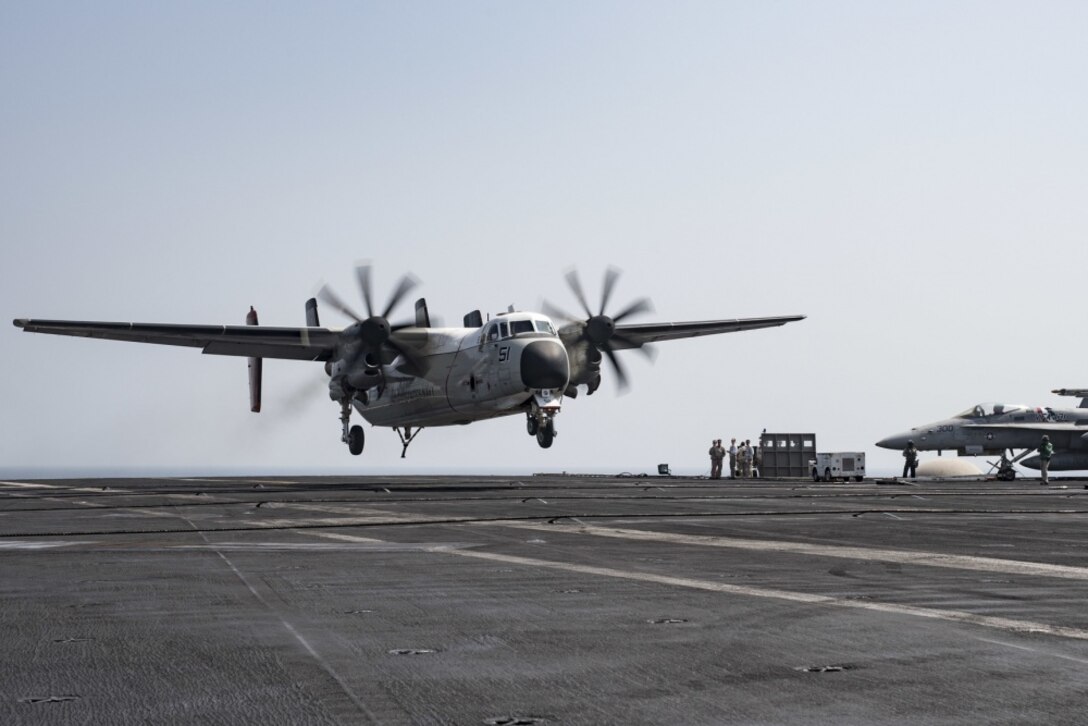 A C2-A Greyhound assigned to Fleet Logistics Support Squadron 40 in the Persian Gulf prepares to make an arrested landing Sept. 11, 2016, on the flight deck of the aircraft carrier USS Dwight D. Eisenhower. The Eisenhower and its carrier strike group are deployed in support of Operation Inherent Resolve, maritime security operations and theater security cooperation efforts in the U.S. 5th Fleet area of operations. Navy photo by Petty Officer 3rd Class Nathan T. Beard