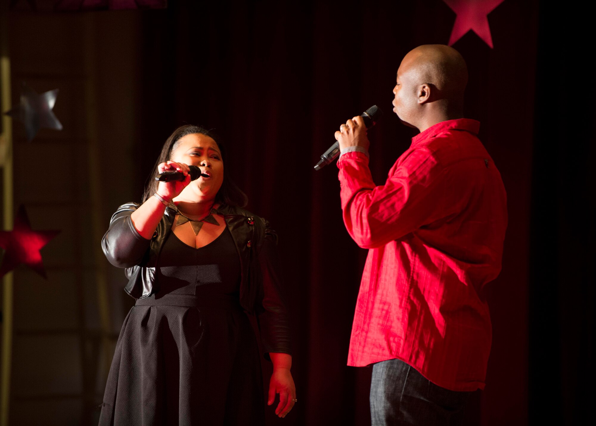 Tech. Sgt. Steven Eckles, 412th Test Wing Chapel Office, and his wife, Karen, perform during Edwards AFB's Operation Talent Search show April 27. They took second place in the Husband and Wife category at the Air Force level competition, which was announced this past week. (U.S. Air Force photo by Joseph Gocong) 