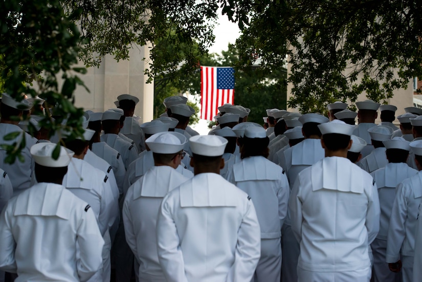 U.S. Navy Sailors stand during a 9/11 memorial ceremony at the Victory Arch in Newport News, Va., Sept. 11, 2016. Sailors from the USS Abraham Lincoln, USS Gerald R. Ford, and USS Enterprise were in attendance. (U.S. Air Force photo by Staff Sgt. J.D. Strong II)