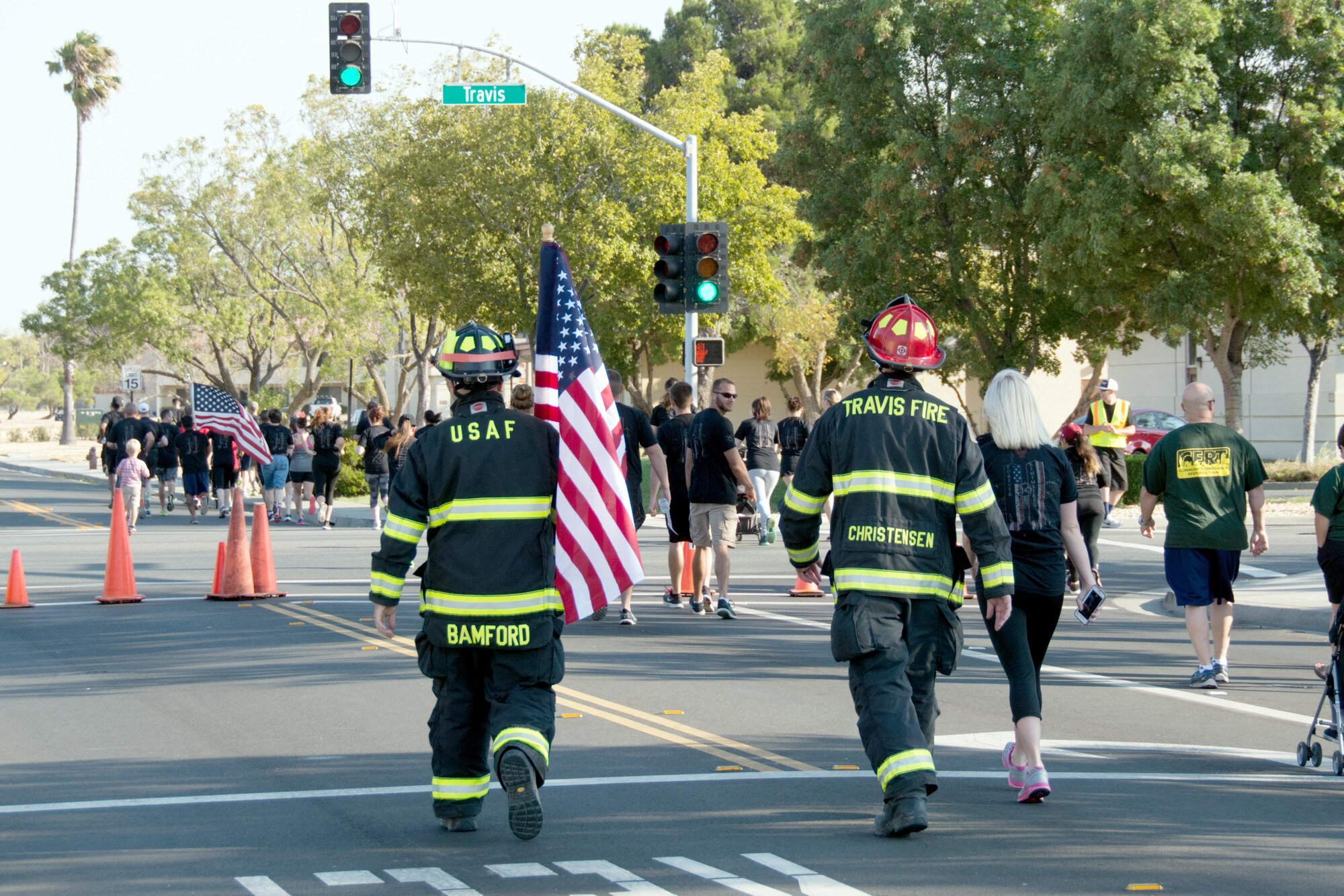 Senior Airman Nicholas Bamford and Nicholas Christensen, both 60th Civil Engineers Squadron firefighters, begin the 3.43 mile Run for the Fallen event on Sept. 10, 2016 at Travis Air Force Base, Calif. The run was held to honor the 343 firefighters who lost their lives on Sept. 11, 2001. (U.S. Air Force photo by Senior Airman Shelby R. Horn/Released)