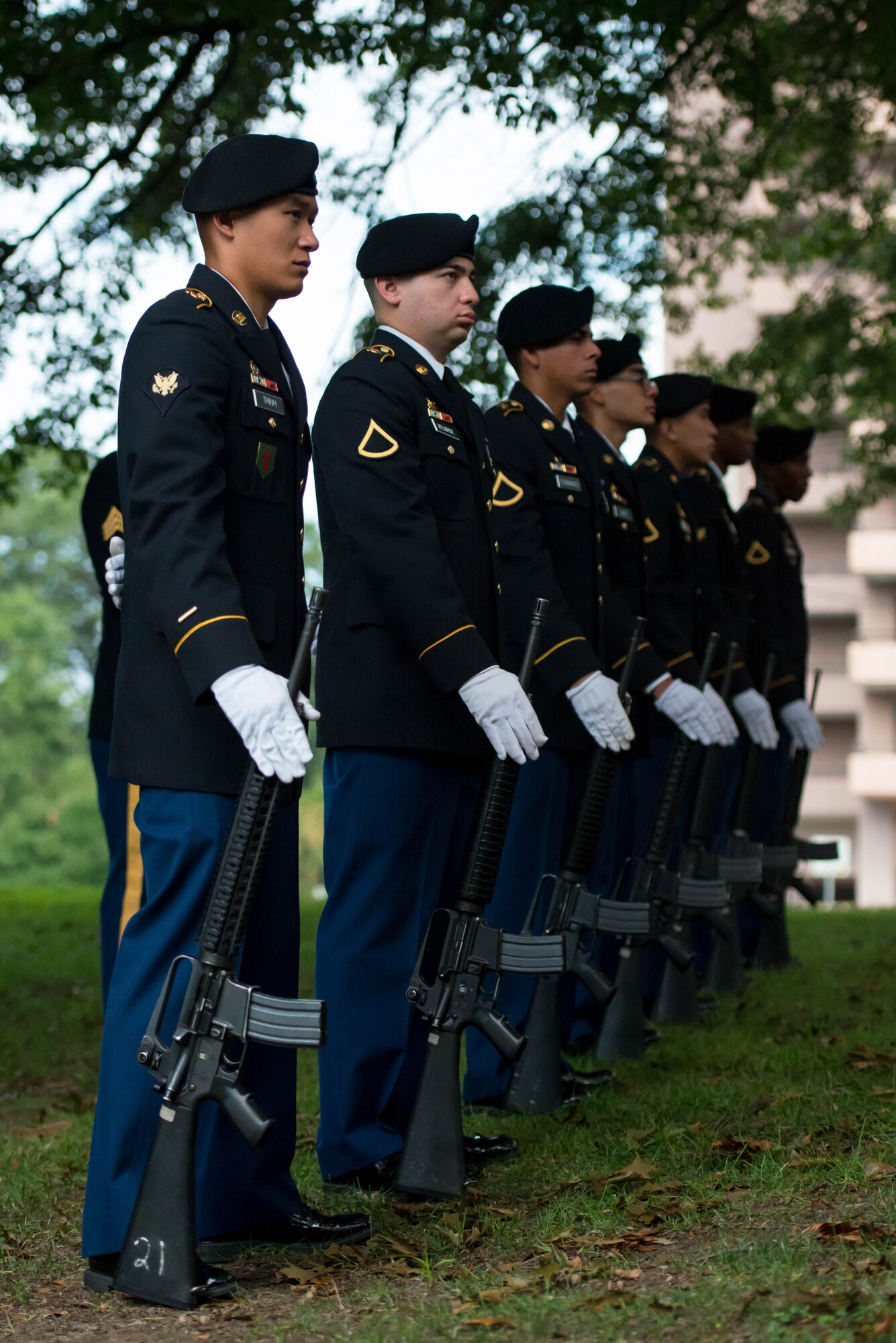 Soldiers from the 7th Transportation Brigade (Expeditionary) firing squad stand at parade rest during a 9/11 memorial ceremony at the Victory Arch in Newport News, Va., Sept. 11, 2016. The 7th Transportation Brigade (Expeditionary) firing squad performed a 21-gun salute to honor the 2,977 people who lost their lives in the 2001 attacks. (U.S. Air Force photo by Staff Sgt. J.D. Strong II)